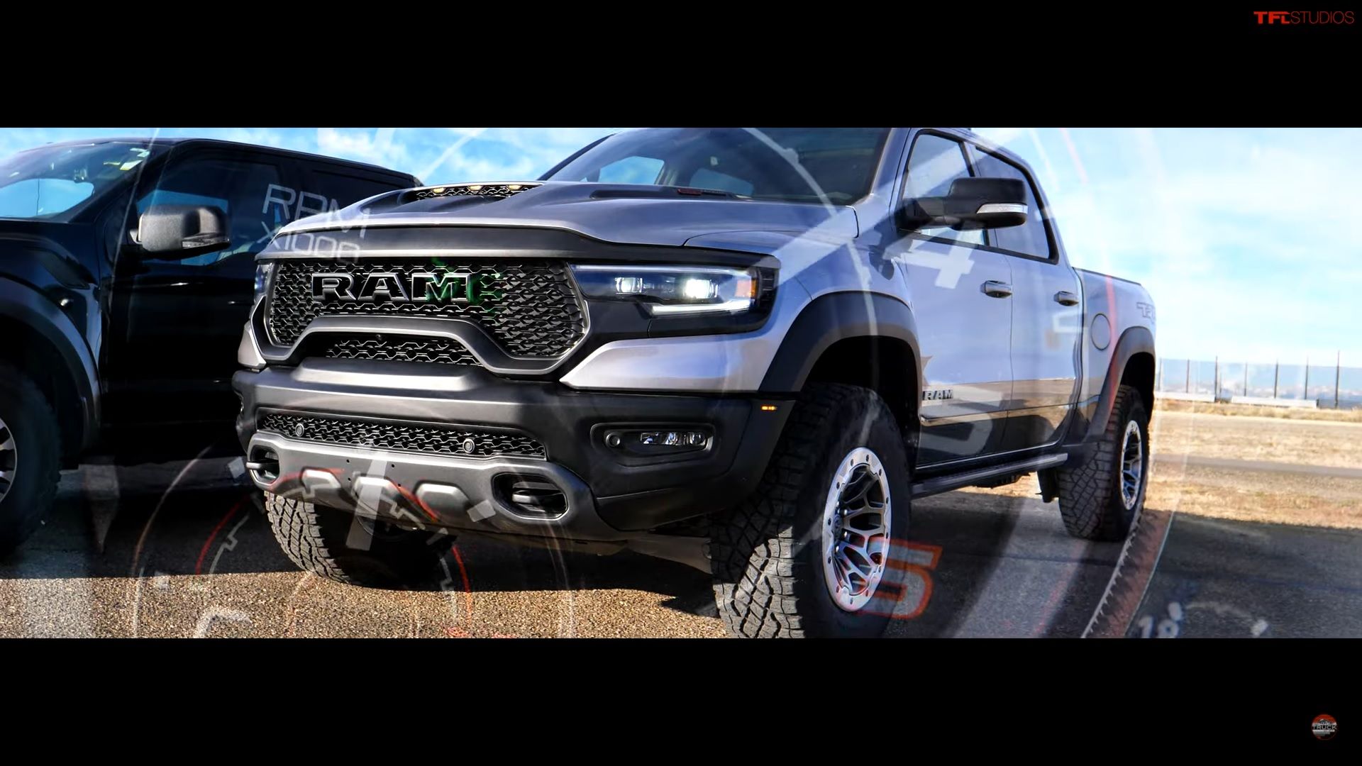 Watch The Ram Trx And The Ford F Raptor Come Face To Face In This