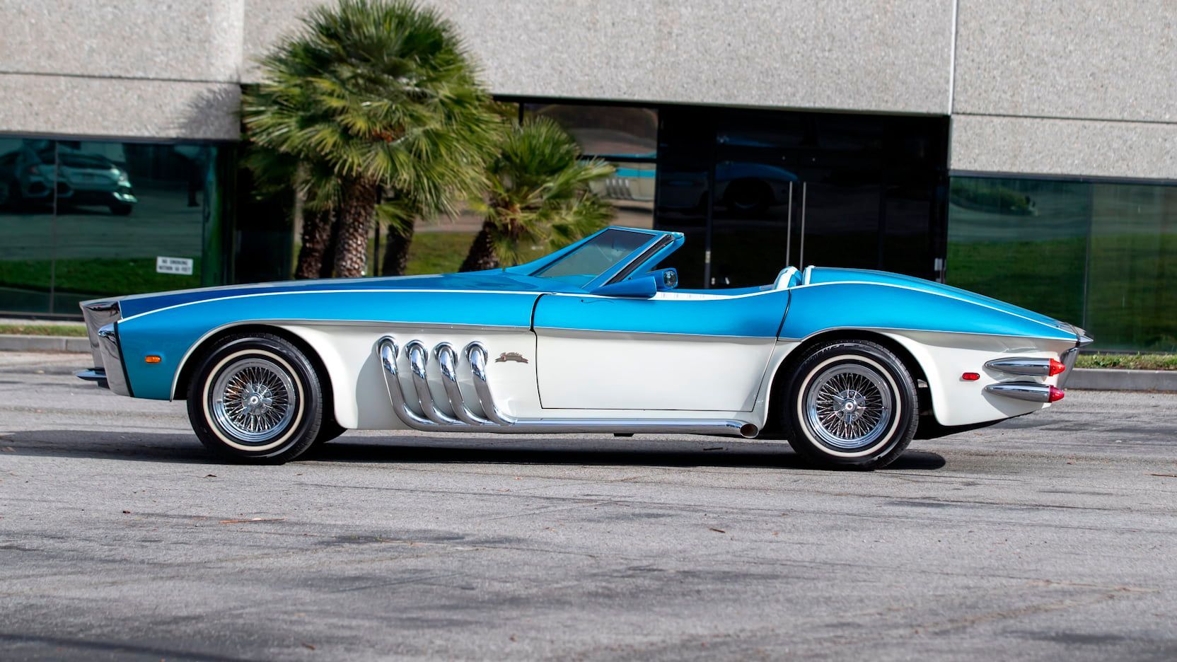 blue and white 1969-Chevrolet-Corvette-Barrister from the side