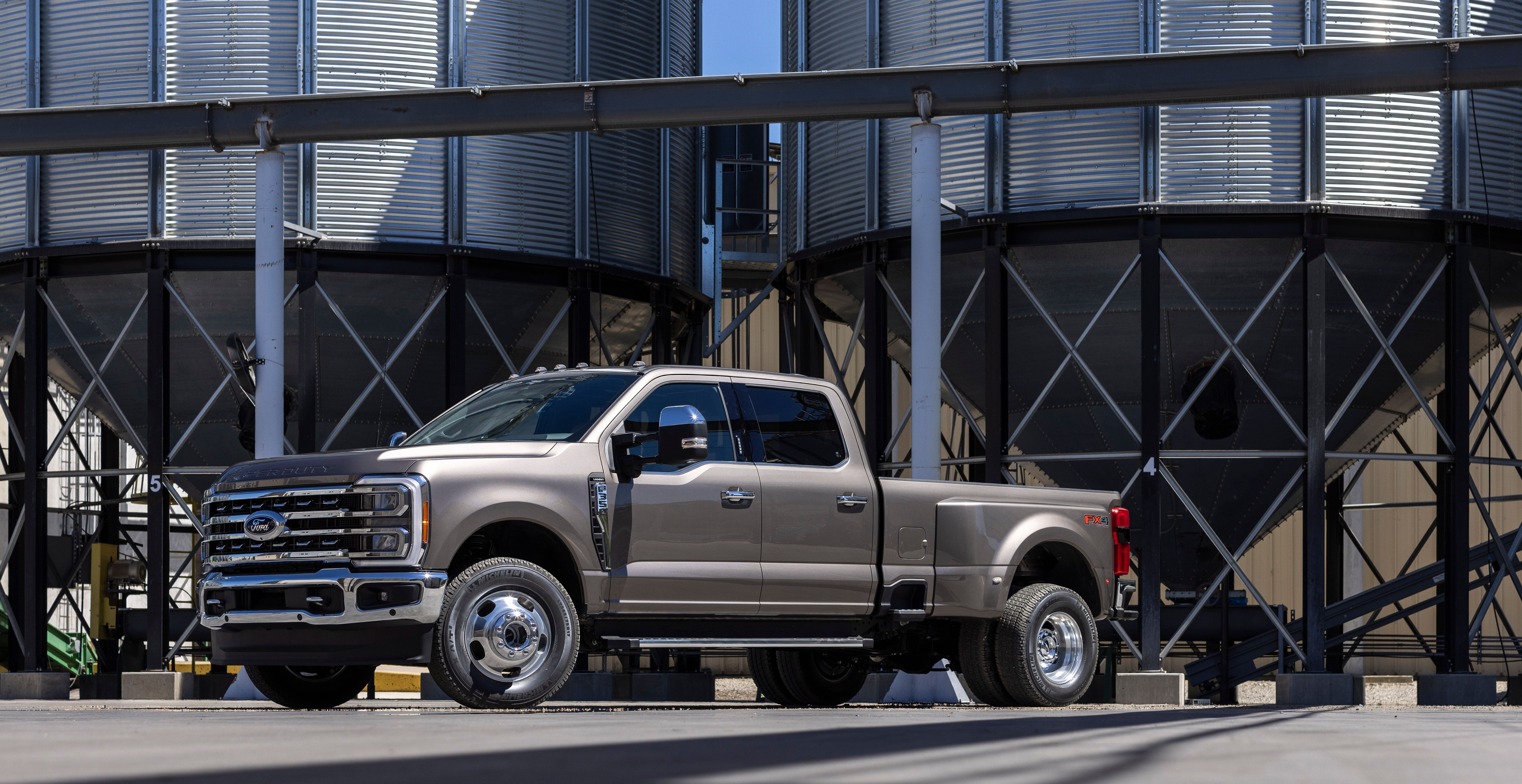 2023 Ford Super Duty F-350 Lariat in front of an industry