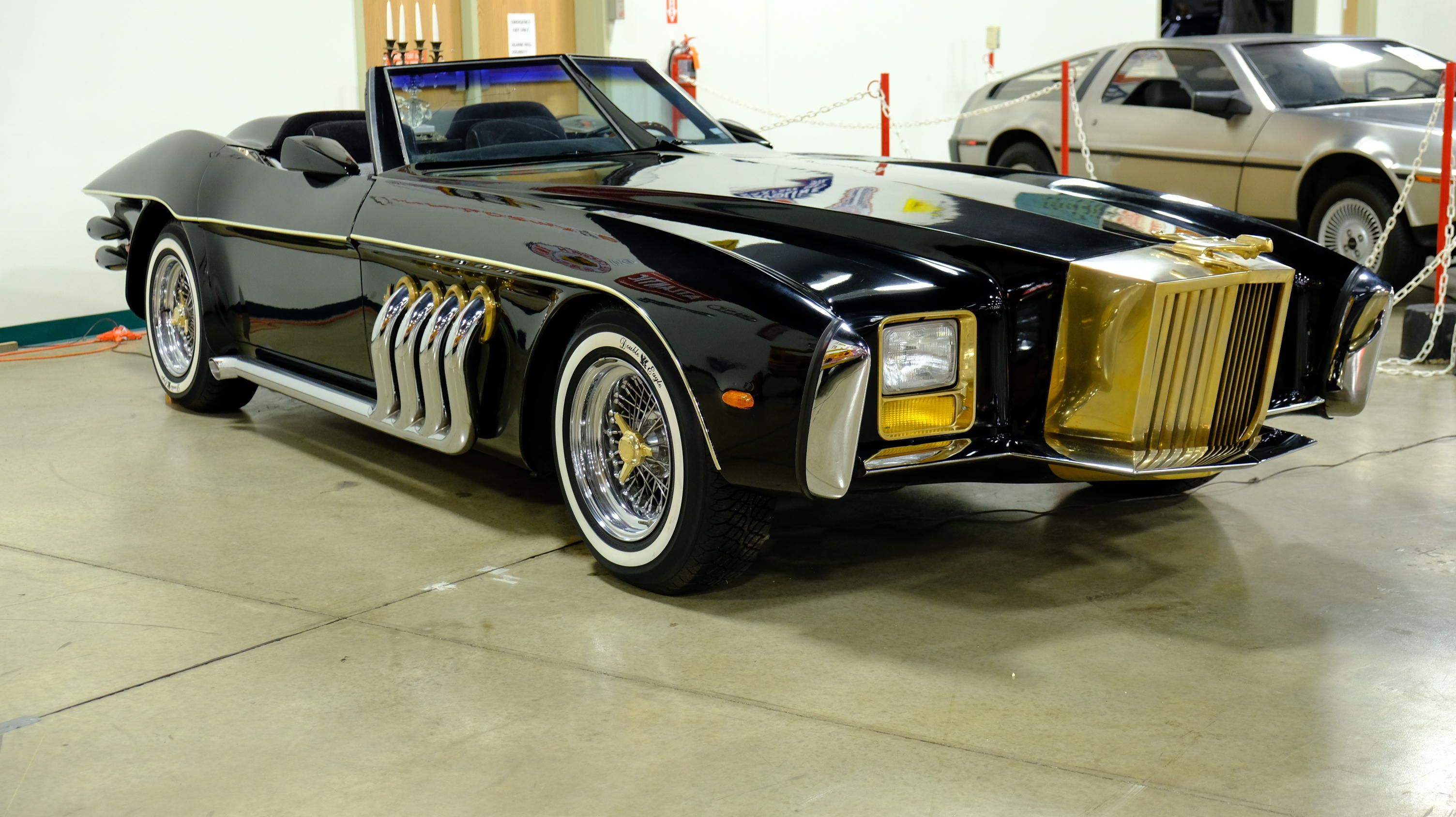a black and gold 1982 Chevrolet Corvette C3 Barrister Custom