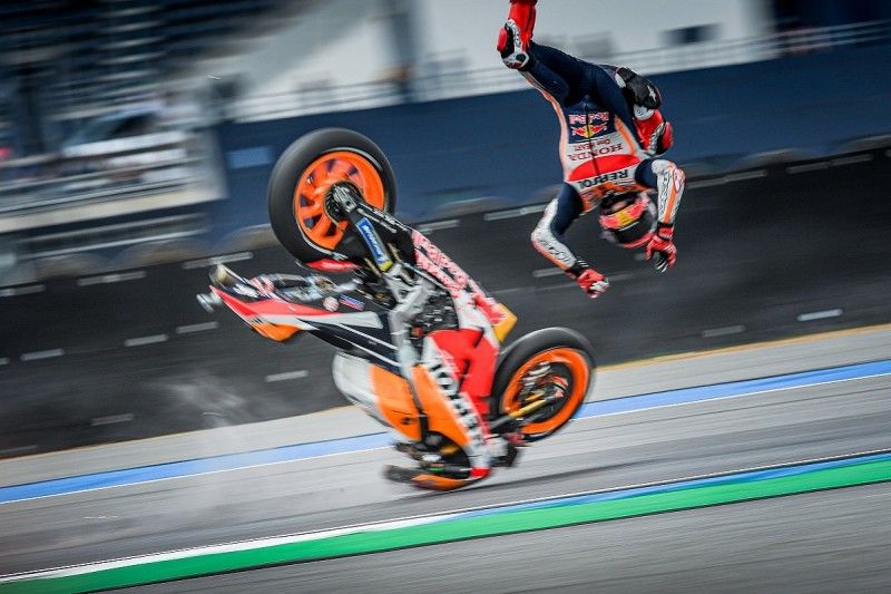 Marquez Moto GP Crash Flying in air action shot