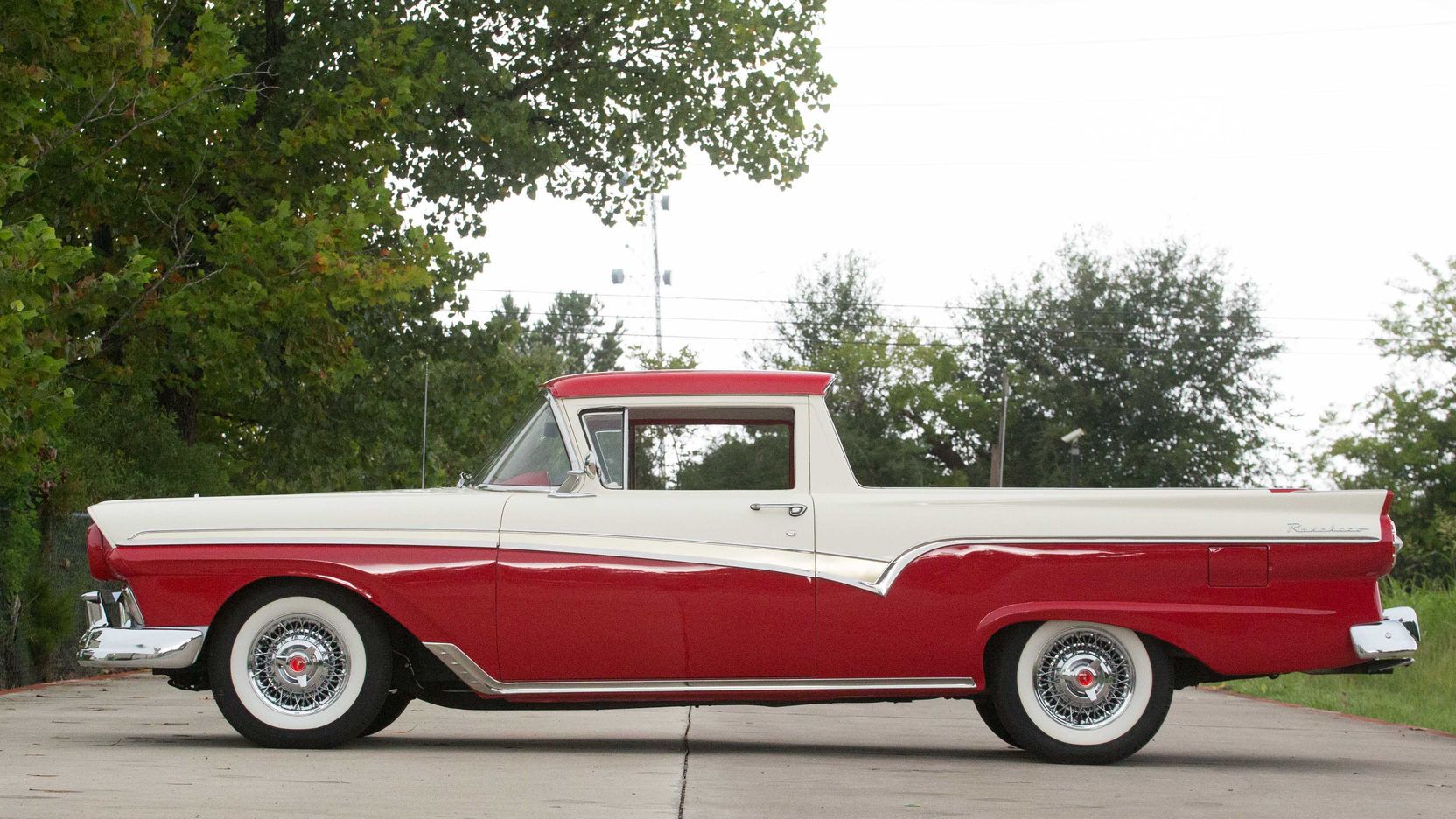 A parked 1957 Ford Ranchero on display