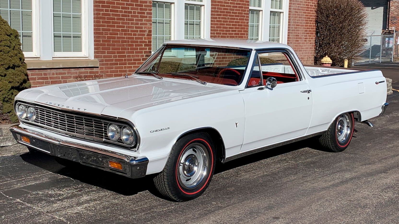 A parked white 1964 Chevy El Camino