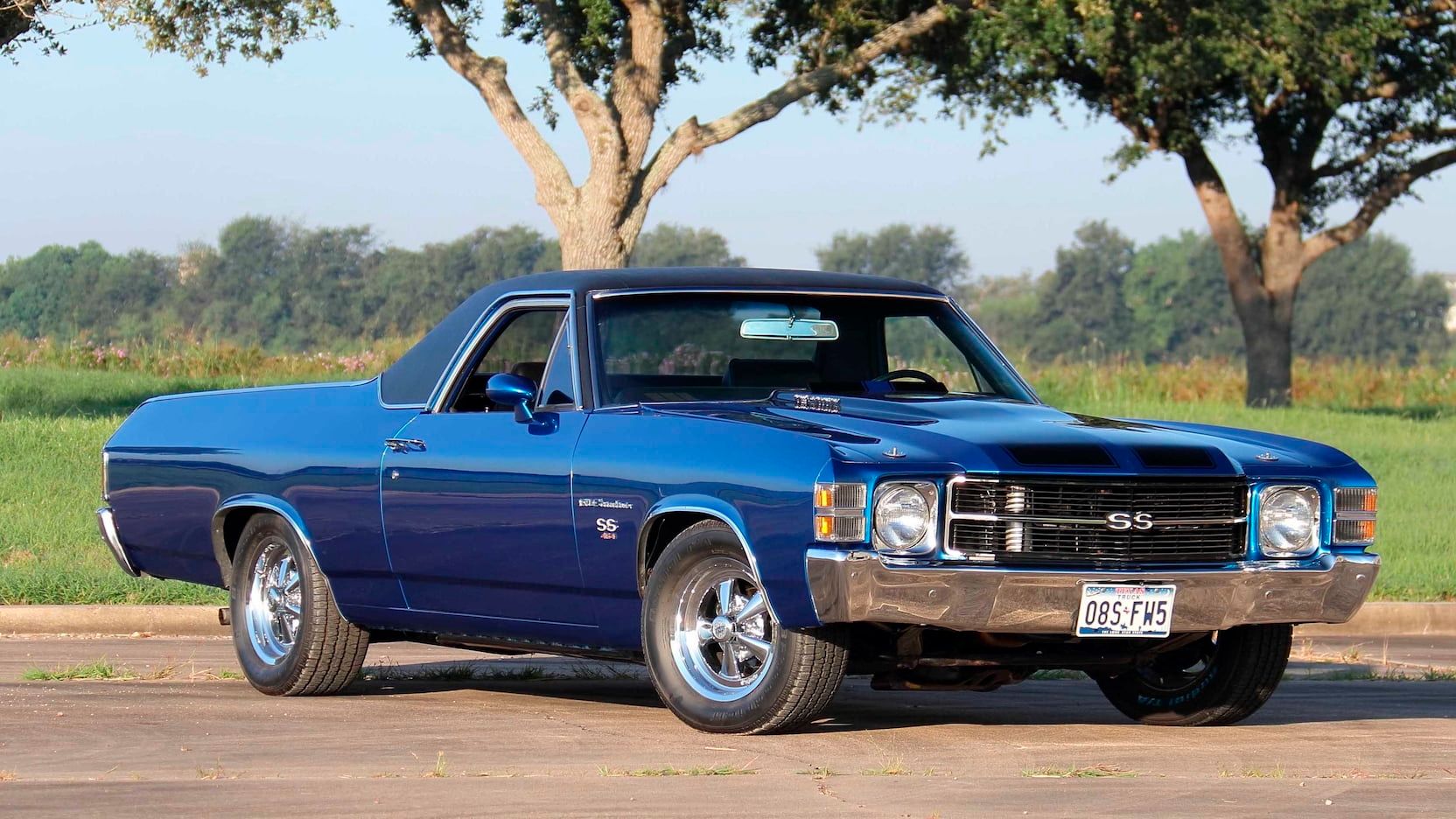 A parked blue 1971 Chevy El Camino SS