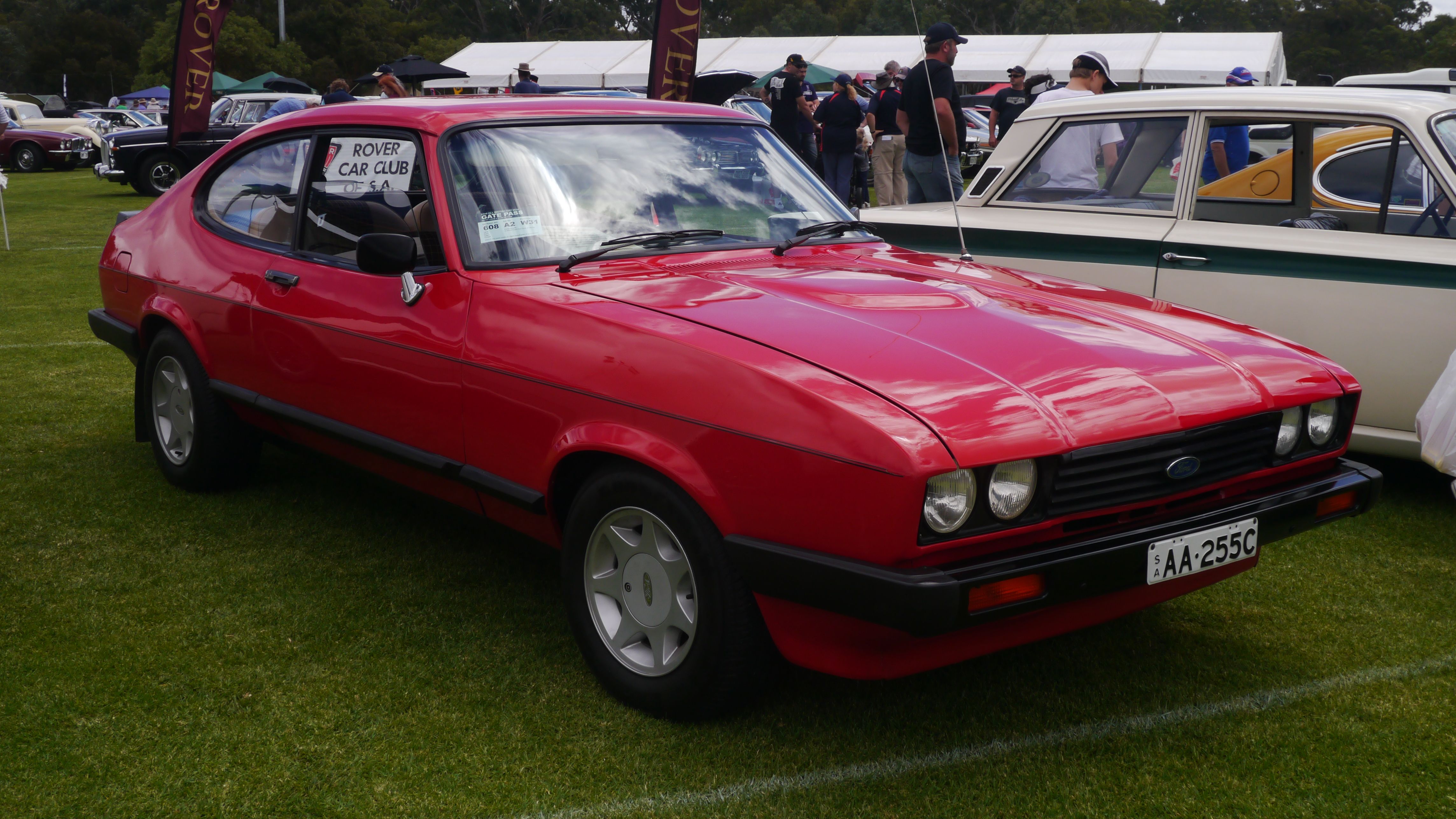 A parked red 1978 Ford Capri MKIII