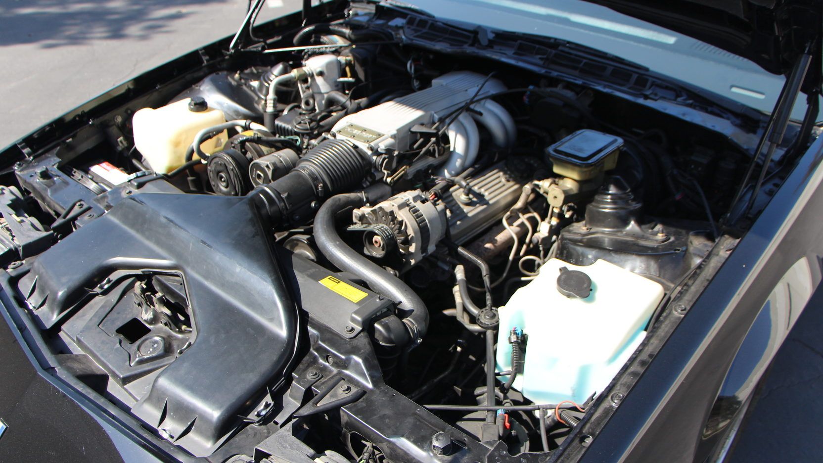 A parked 1988 Chevy Camaro Iroc-Z engine