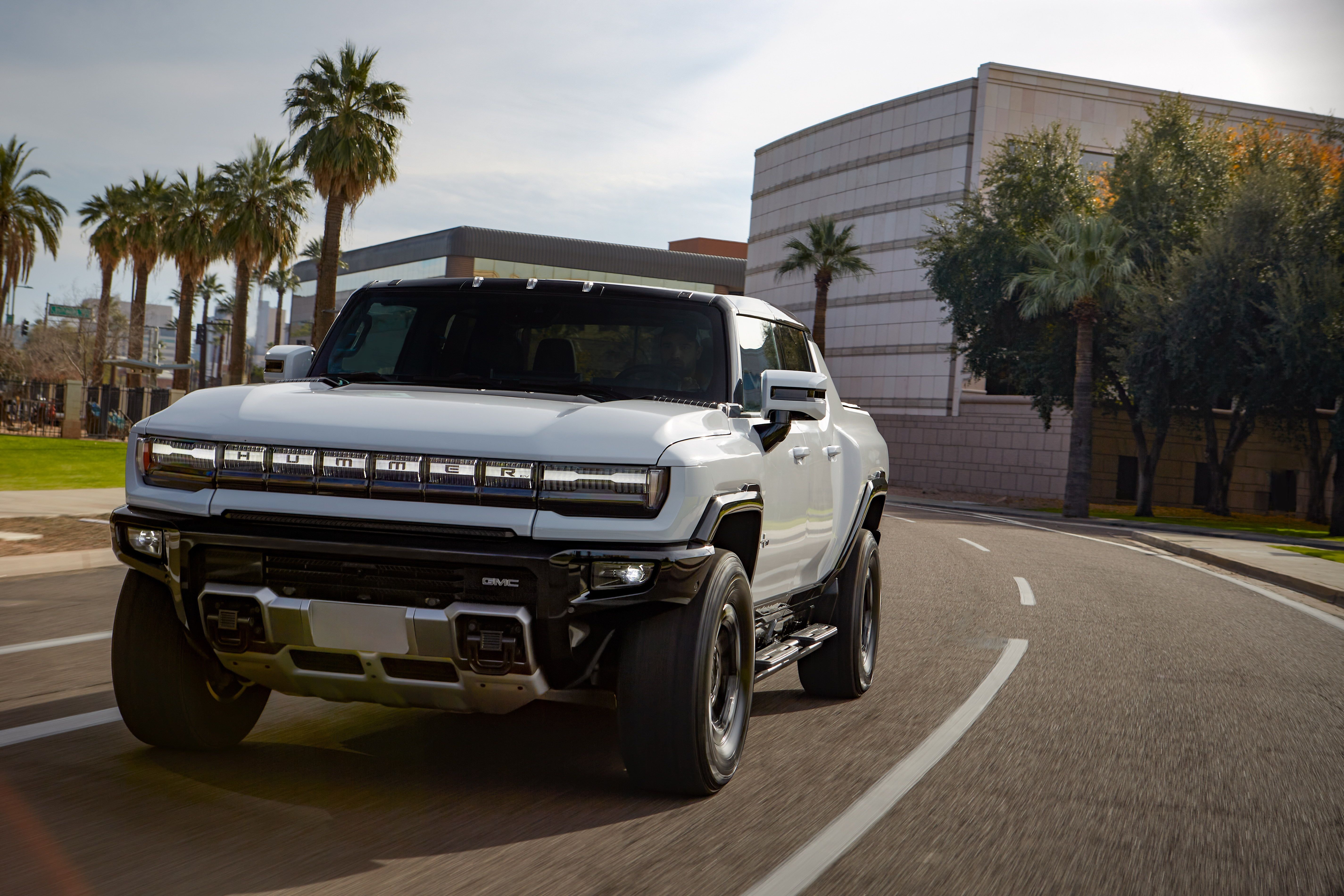 Front shot of the 2022 Hummer EV Pickup Truck on the road