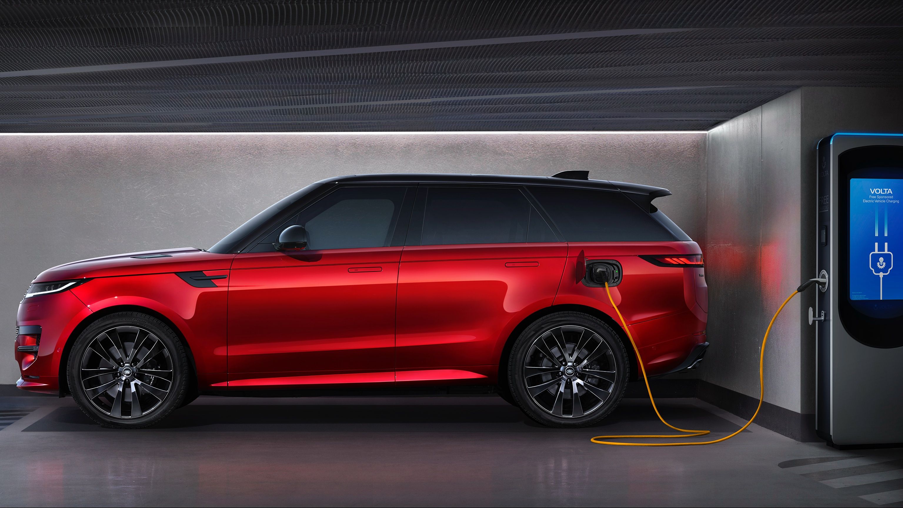A red 2023 Range Rover Sport