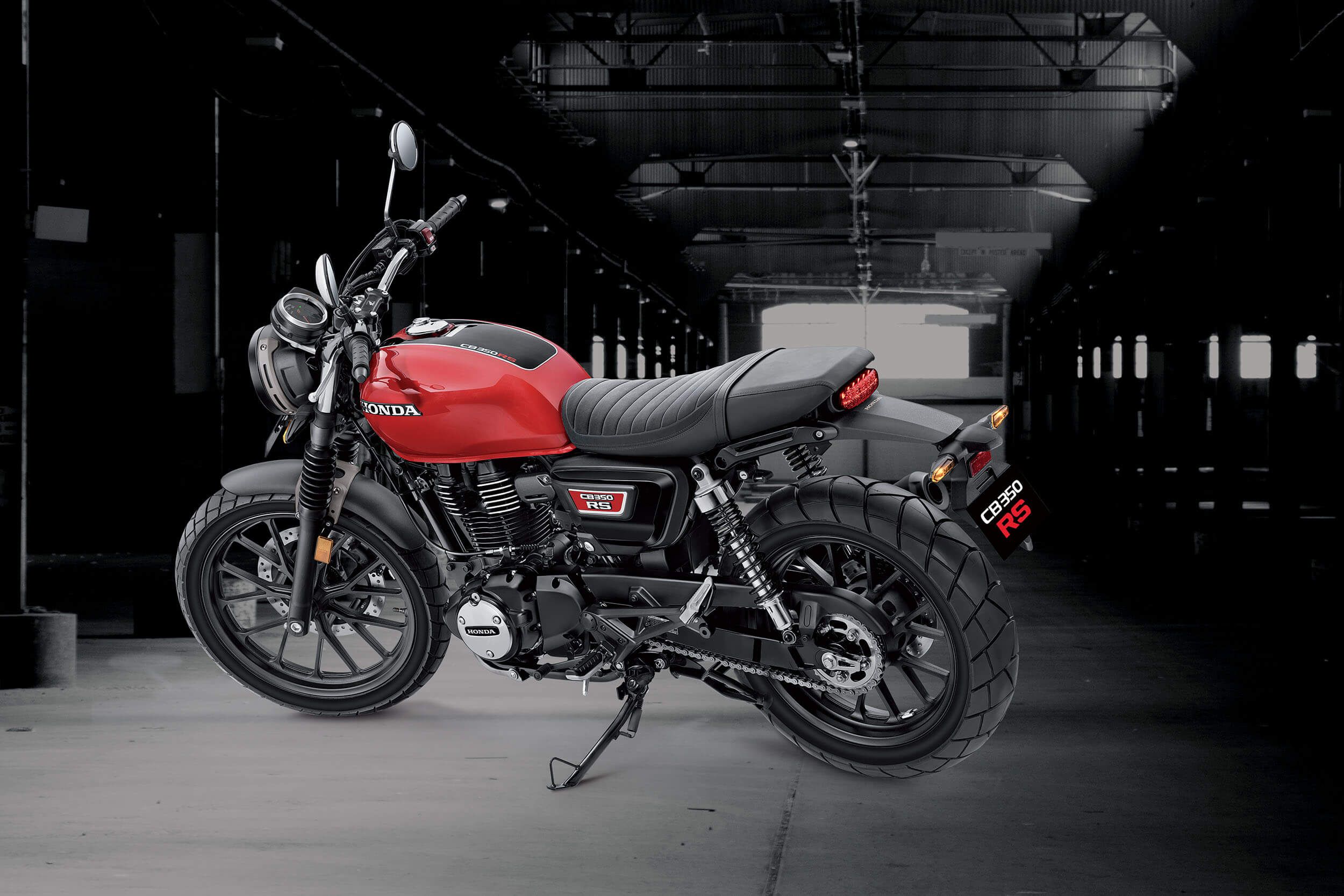 Red 2022 Honda CB350RS in a parking garage