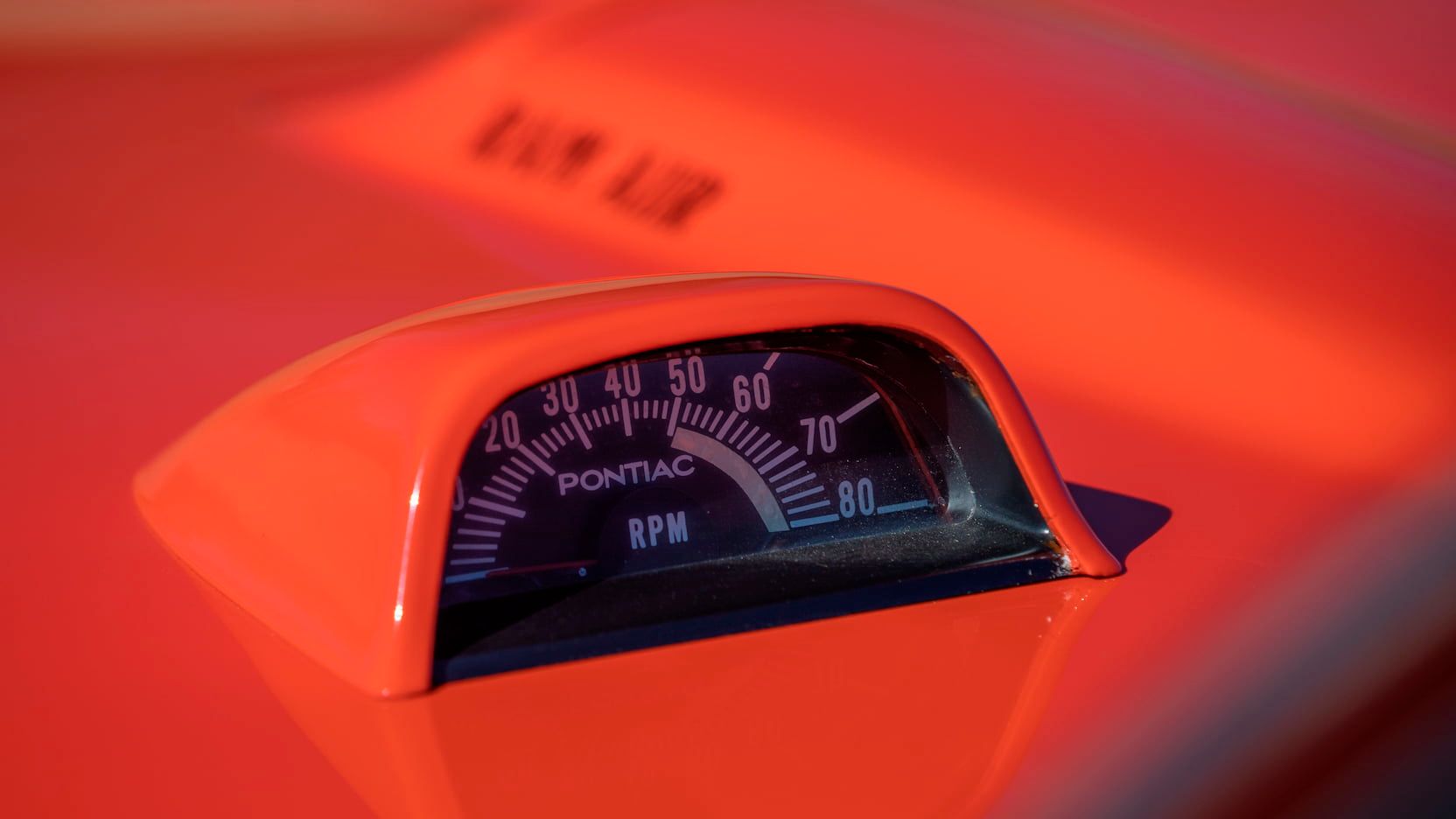 A parked 1969 Pontiac GTO Judge tachometer