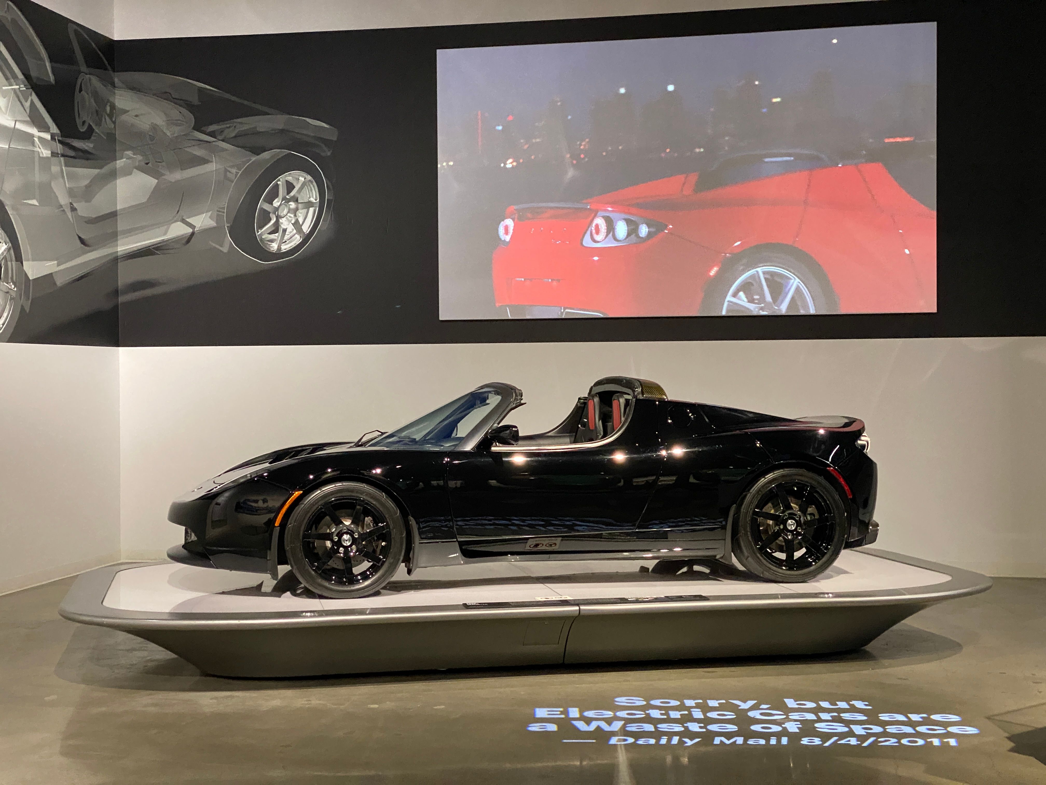 Black 2008 Tesla Roadster parked