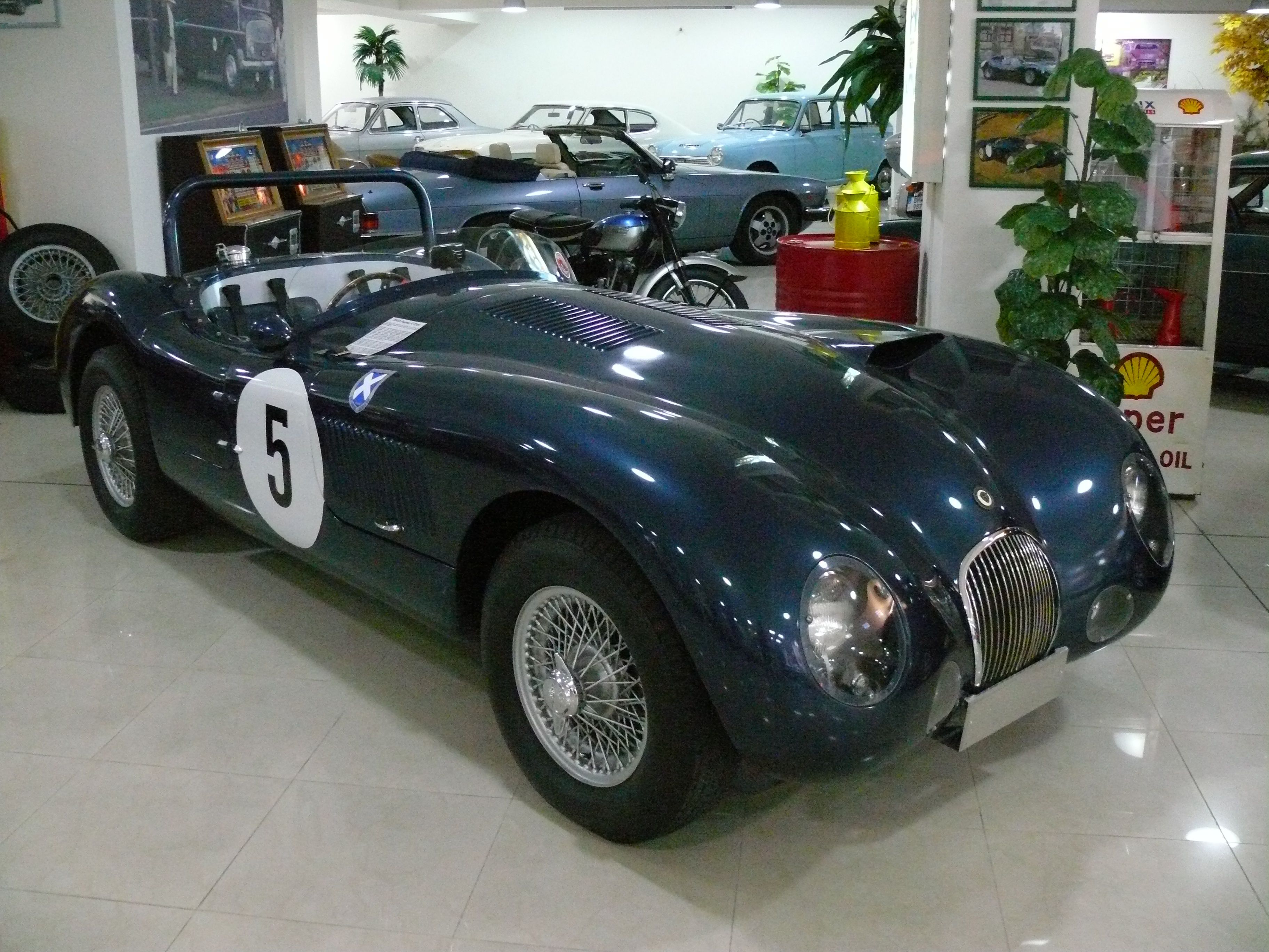 Jaguar C-Type parked indoors