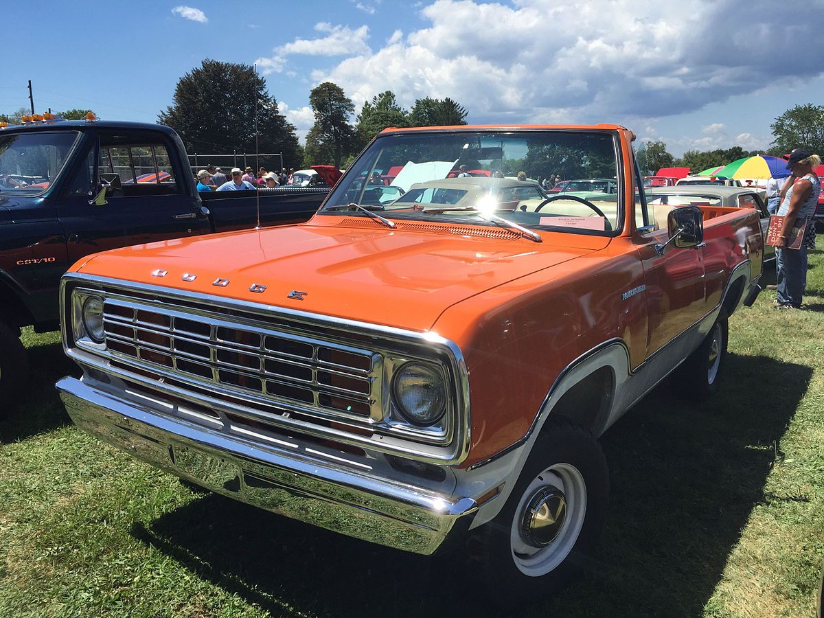 A parked 1974 Dodge Ramcharger with the hood off