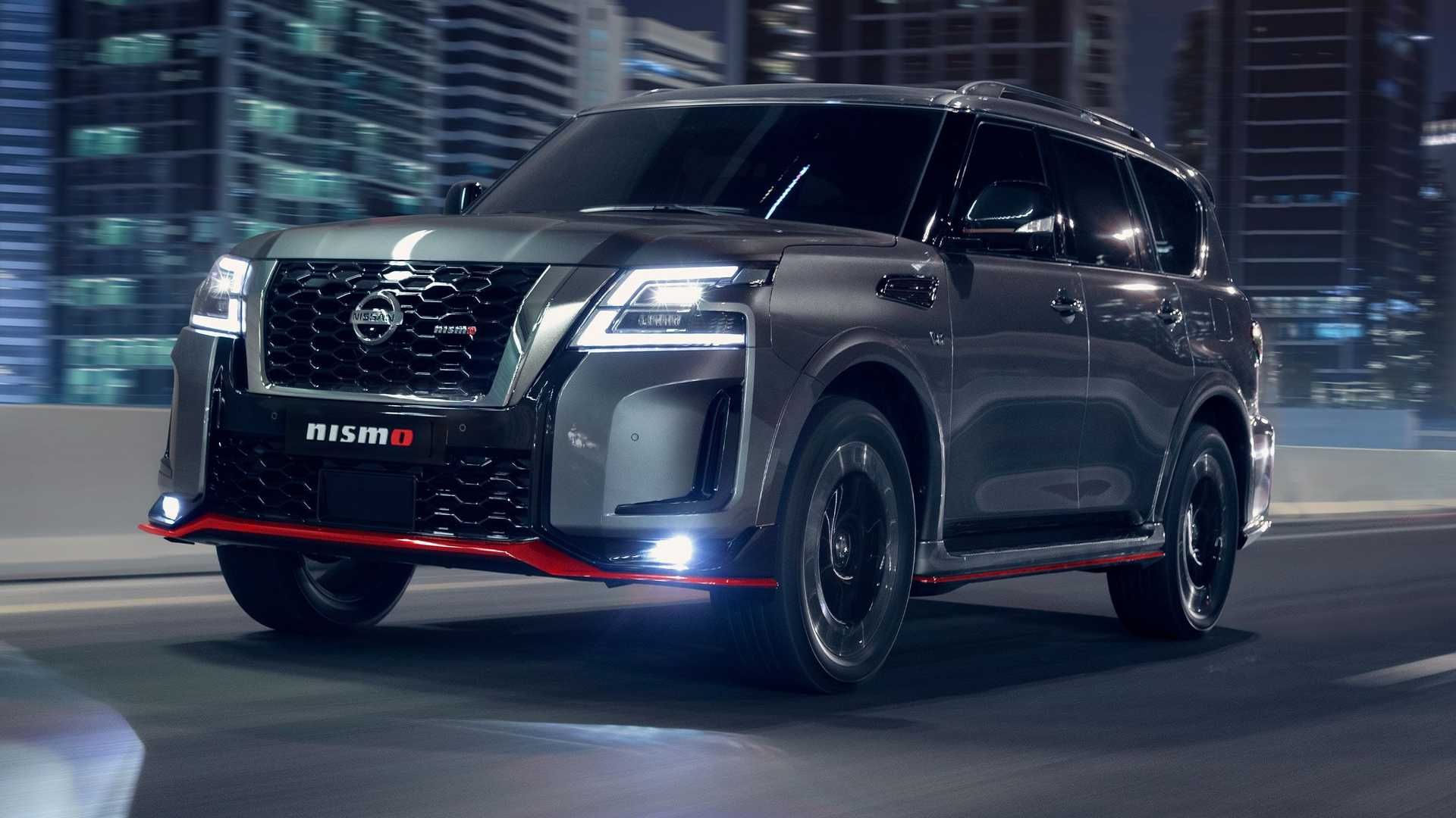 A grey 2022 Nissan Nismo Patrol driving at night.
