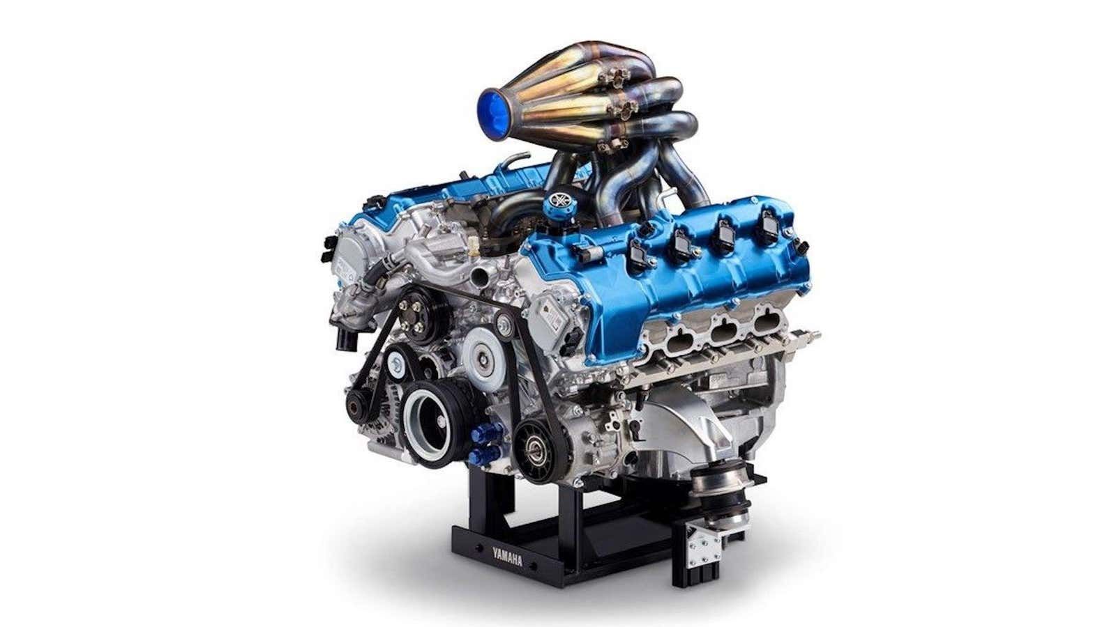 A prototype Toyota/Yamaha Hydrogen V8 Engine sits on an engine stand.