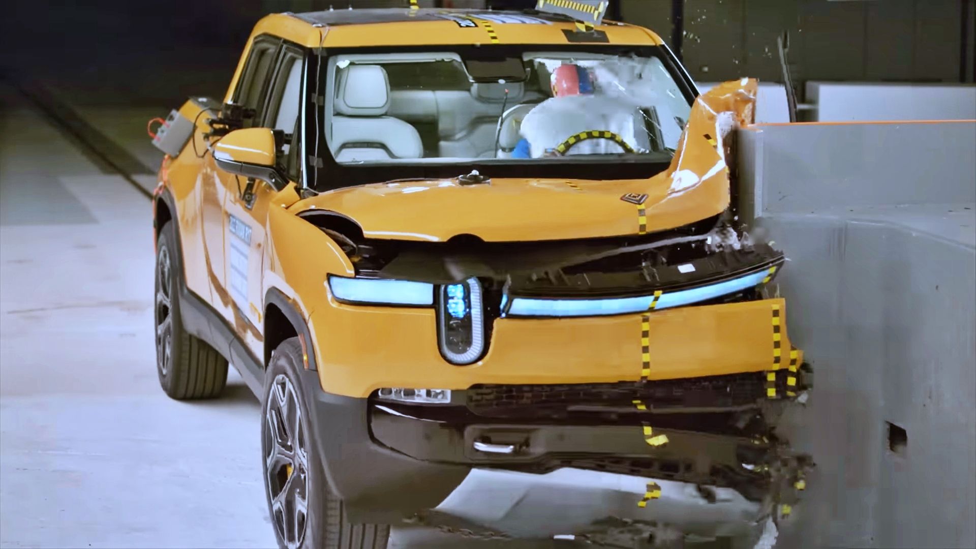 Yellow Rivian R1T Crash