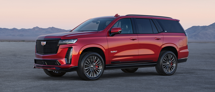 2023 Cadillac Escalade red parked outside