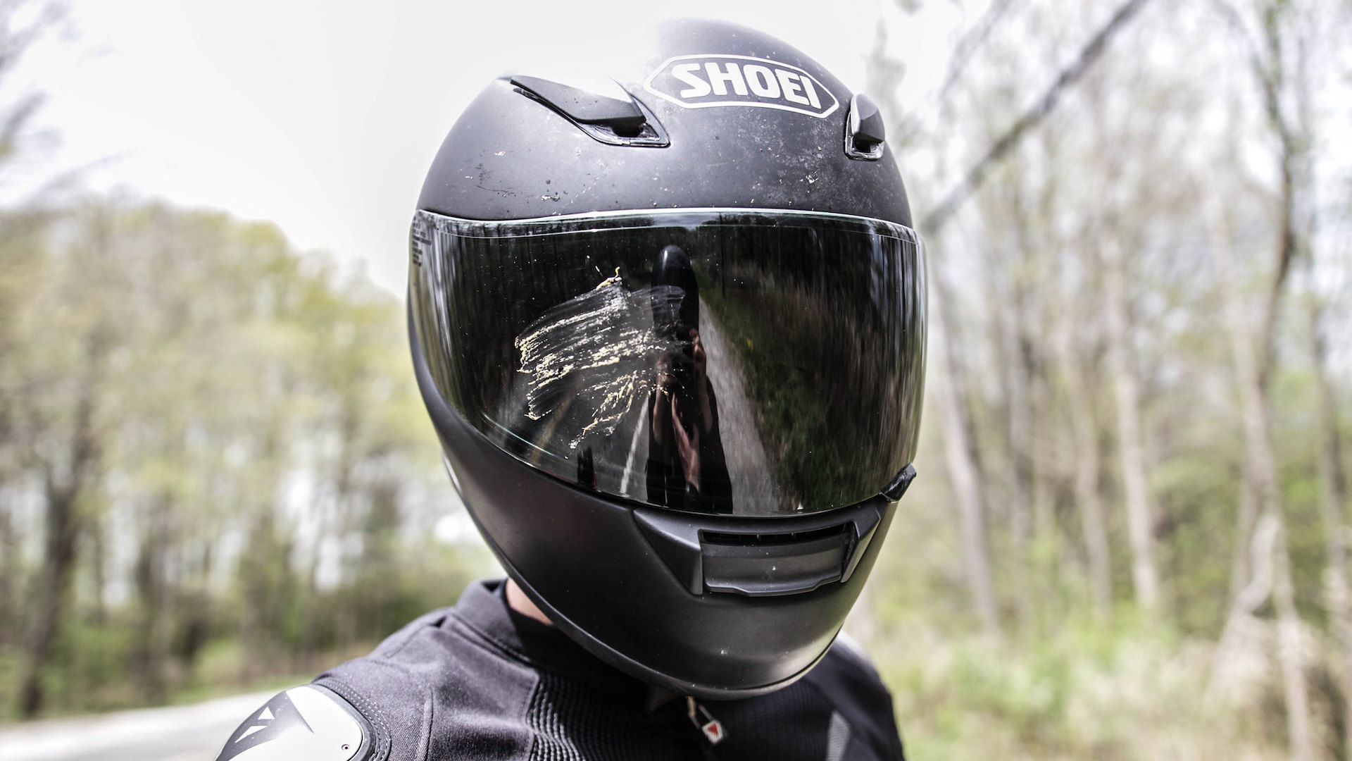 bug splatter on full-face helmet