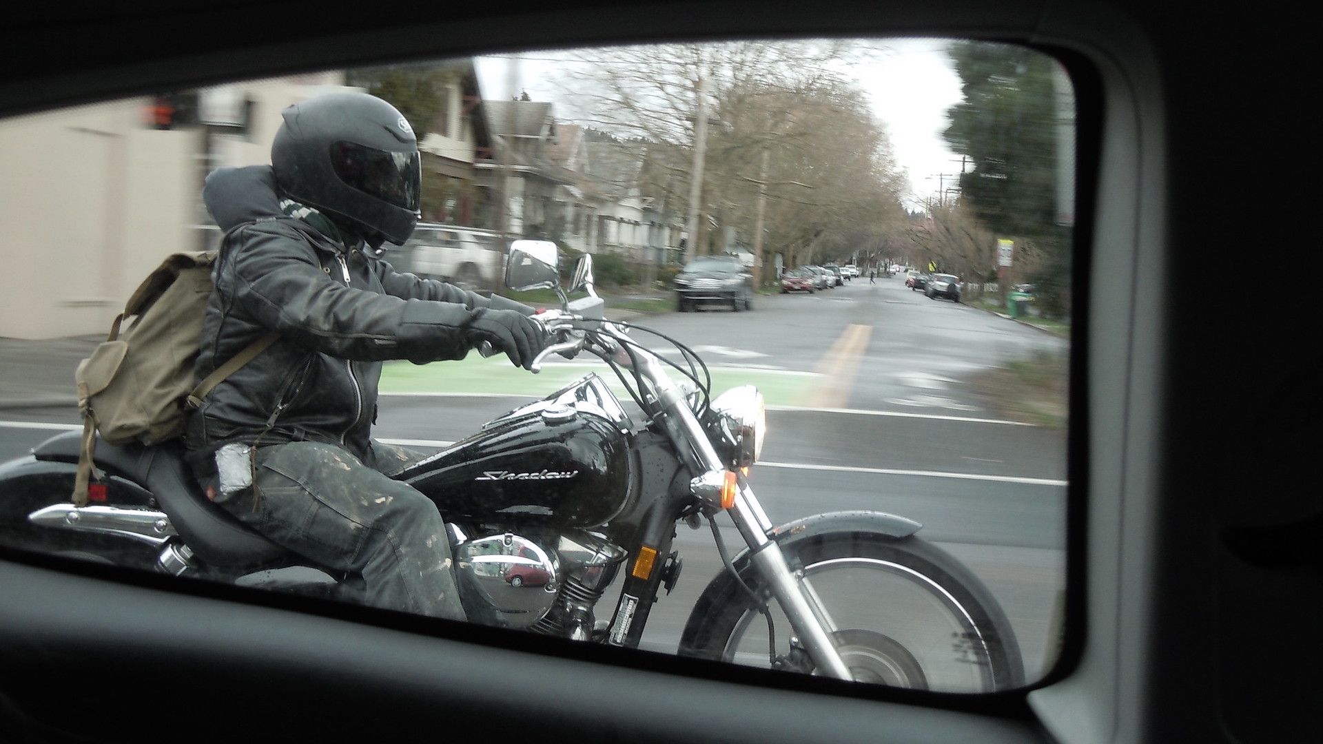 honda shadow rider wearing a full face helmet
