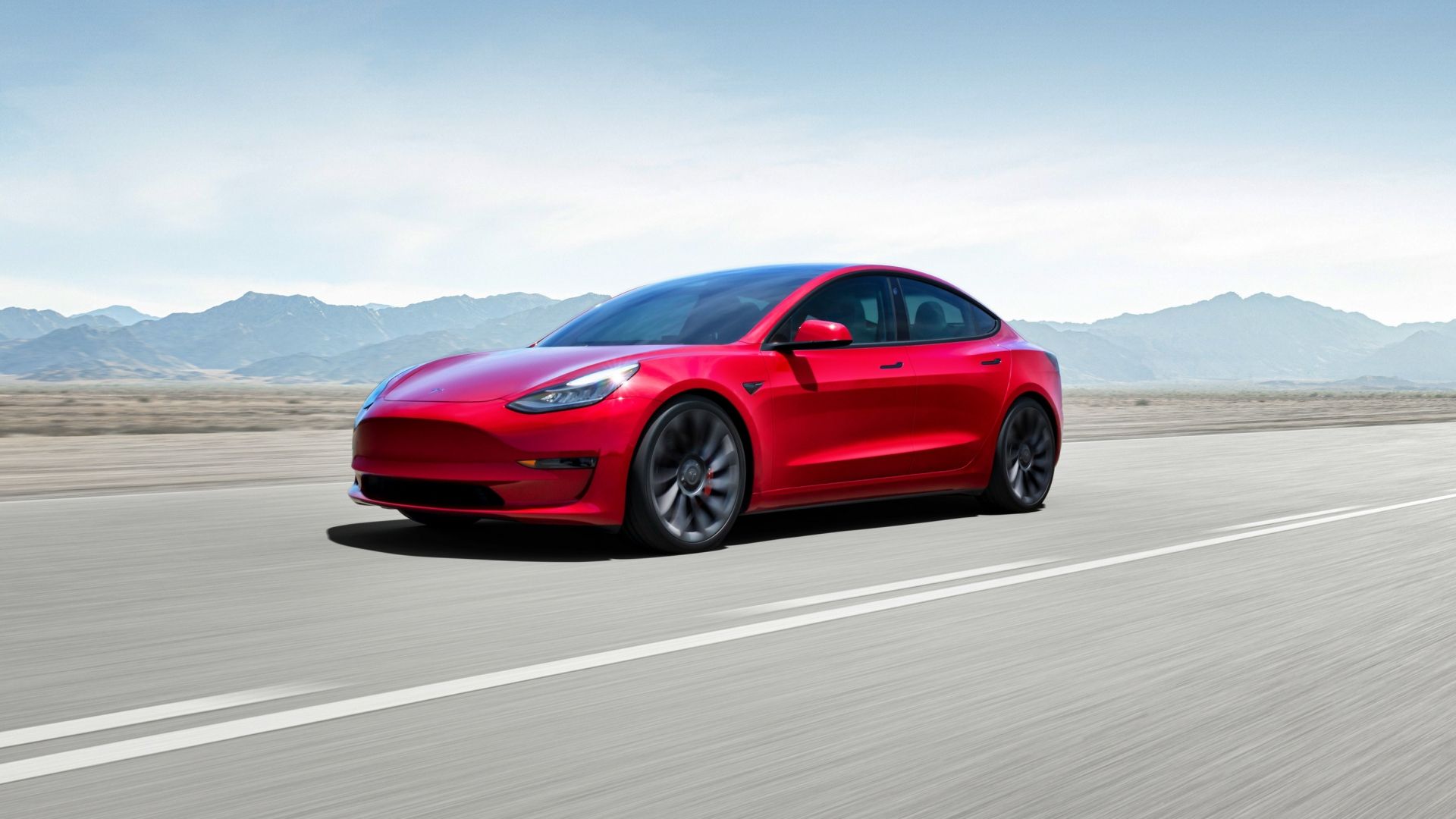 Tesla model 3 merah