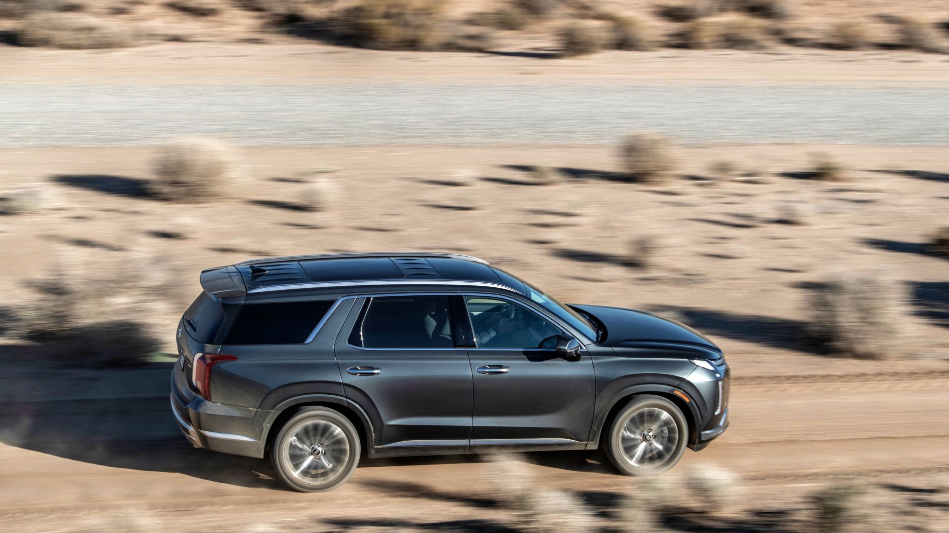 Gray 2023 Hyundai Palisade driving