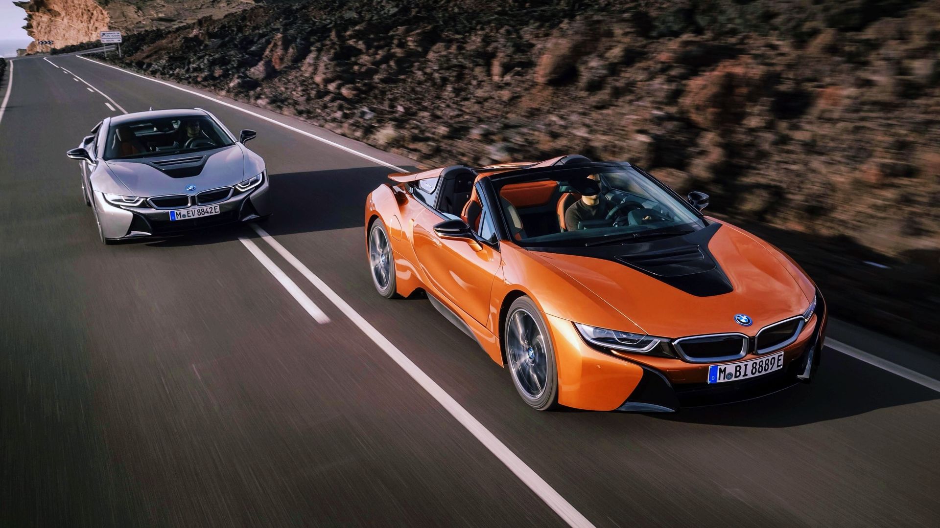 Orange and silver BMW i8 Coupe and Roadster