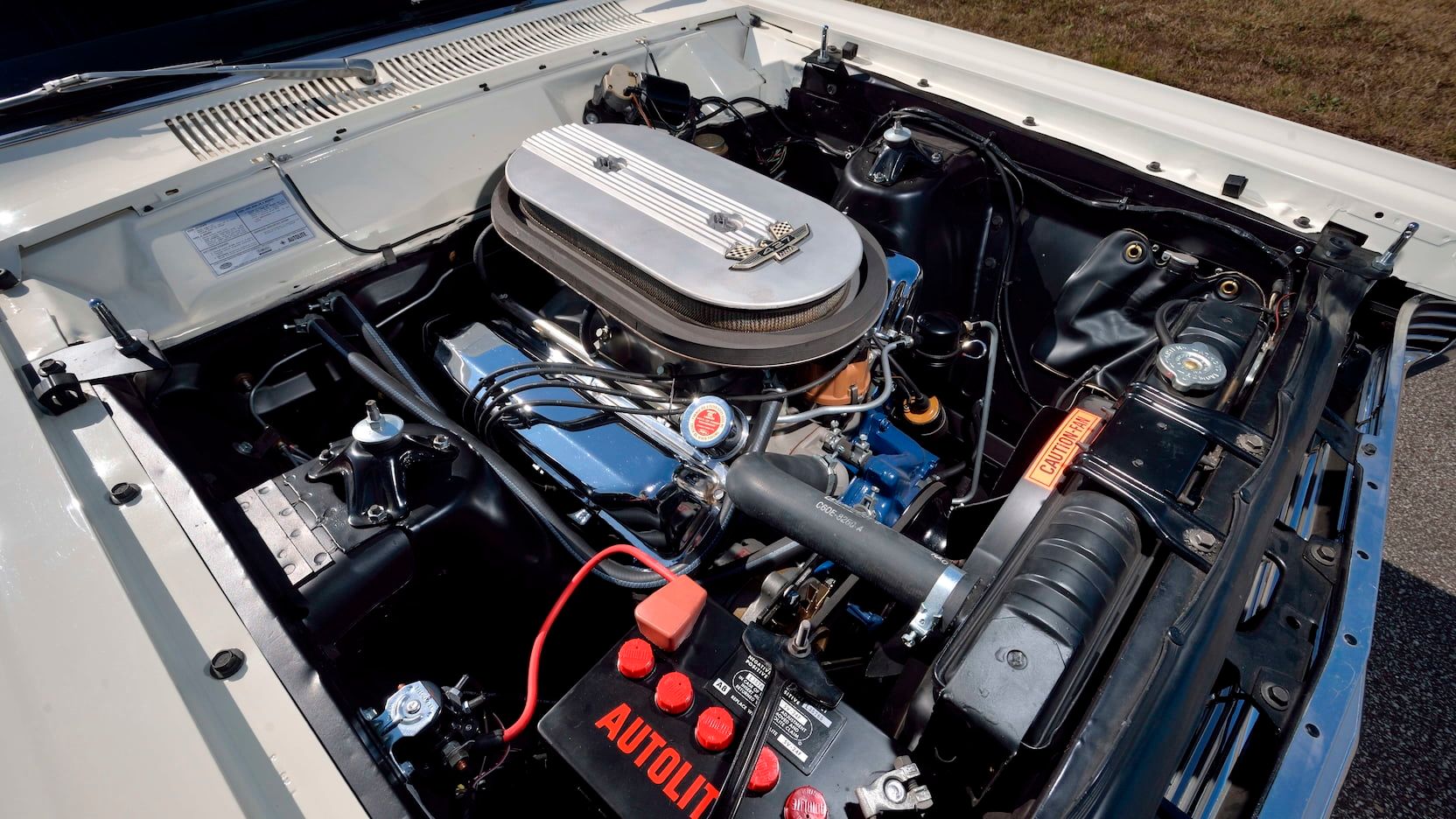 A parekd 1966 Ford Farilane R-Code engine