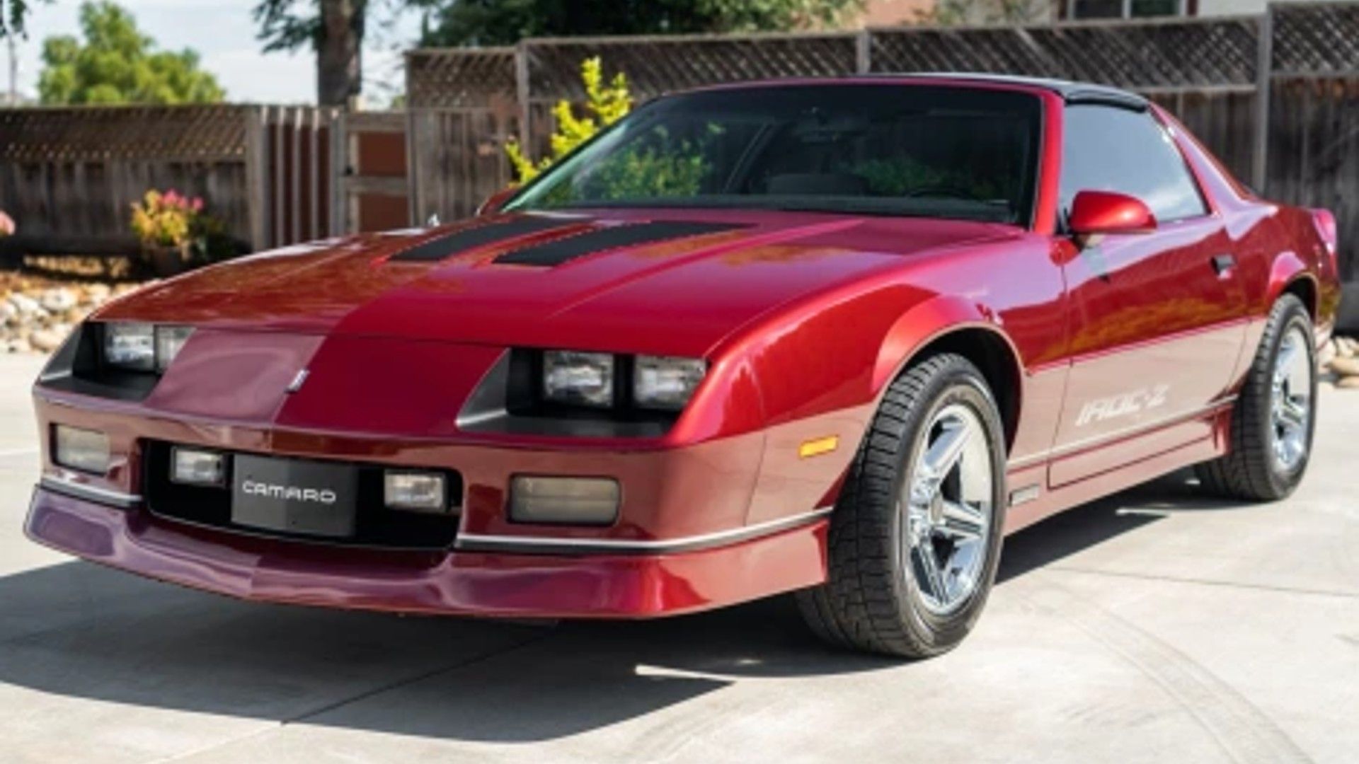 Passenger's side shot of a red 1987 Camaro IROC-Z.