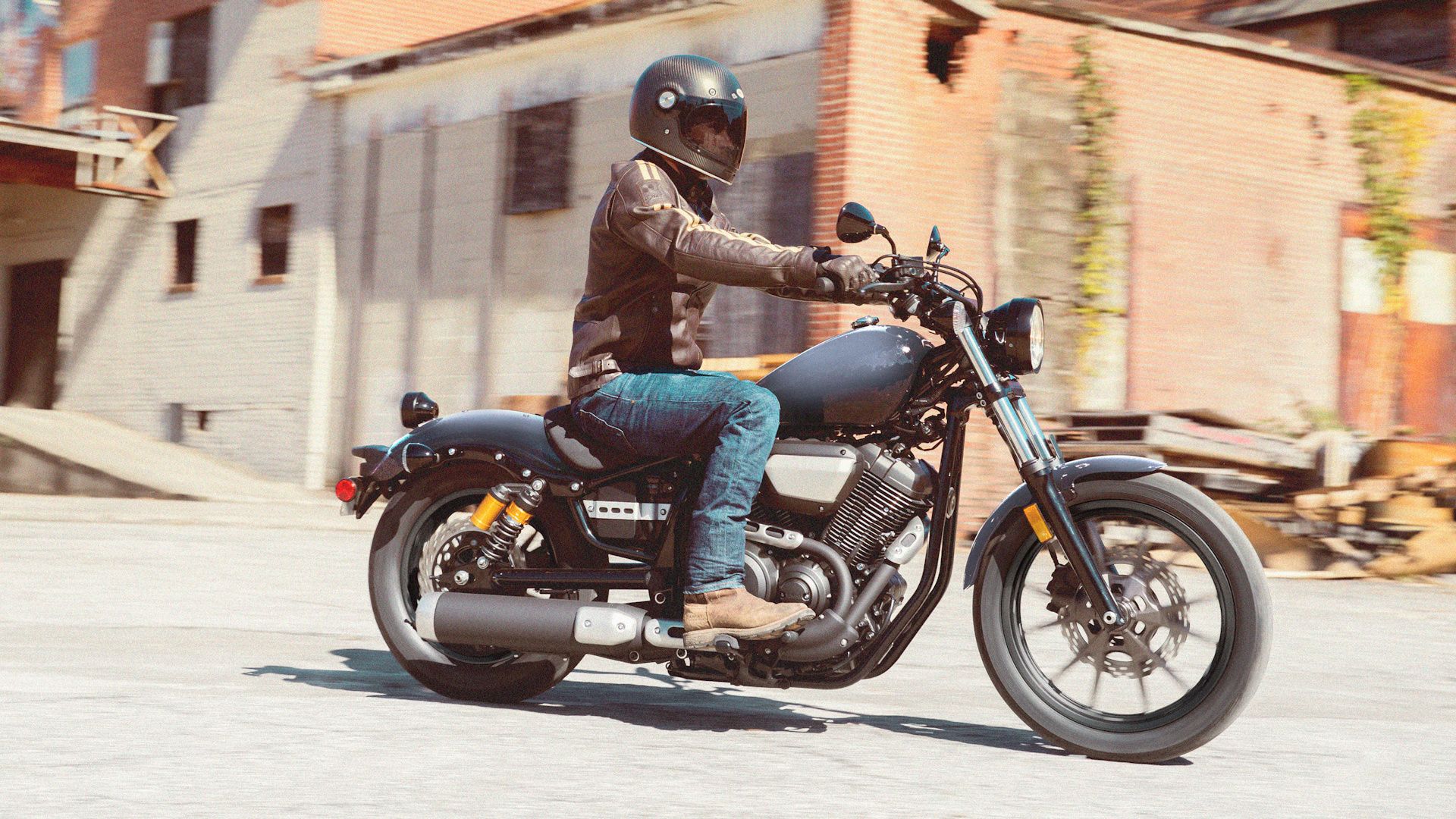 Gray 2023 Yamaha Bolt R-Spec cruising on the road