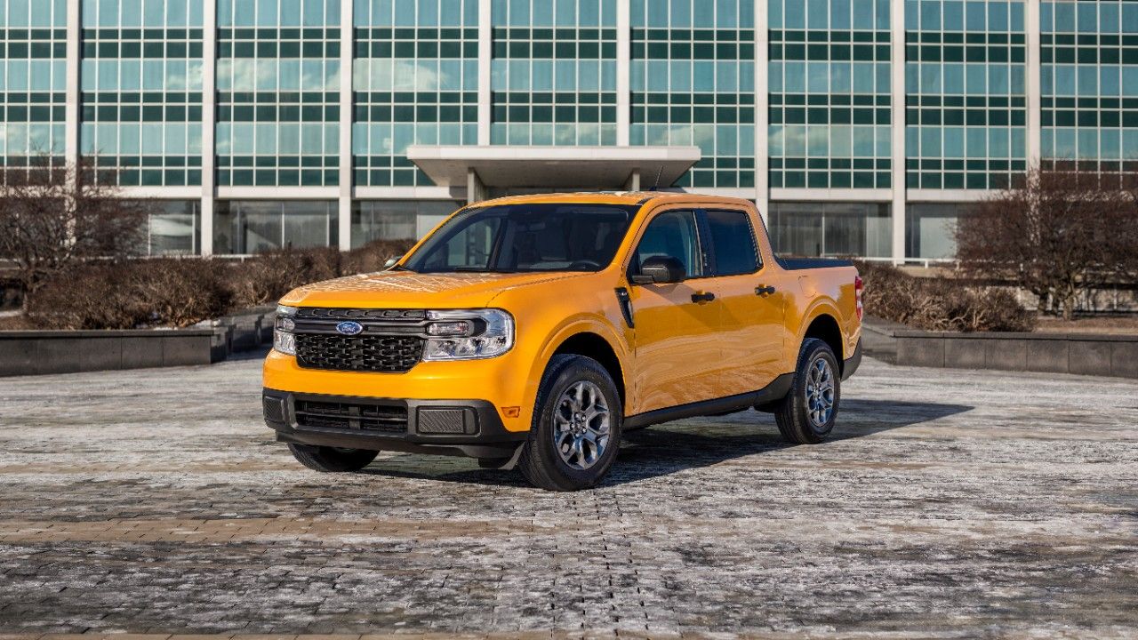 A 2022 yellow Ford Maverick parked