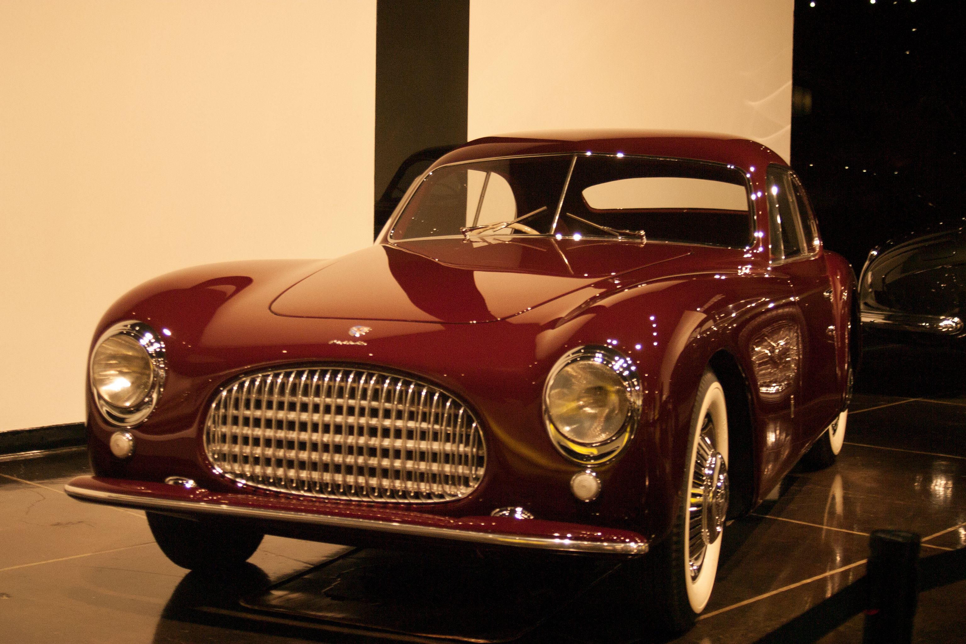 A Dark Red 1947 Cisitalia 202 Coupe