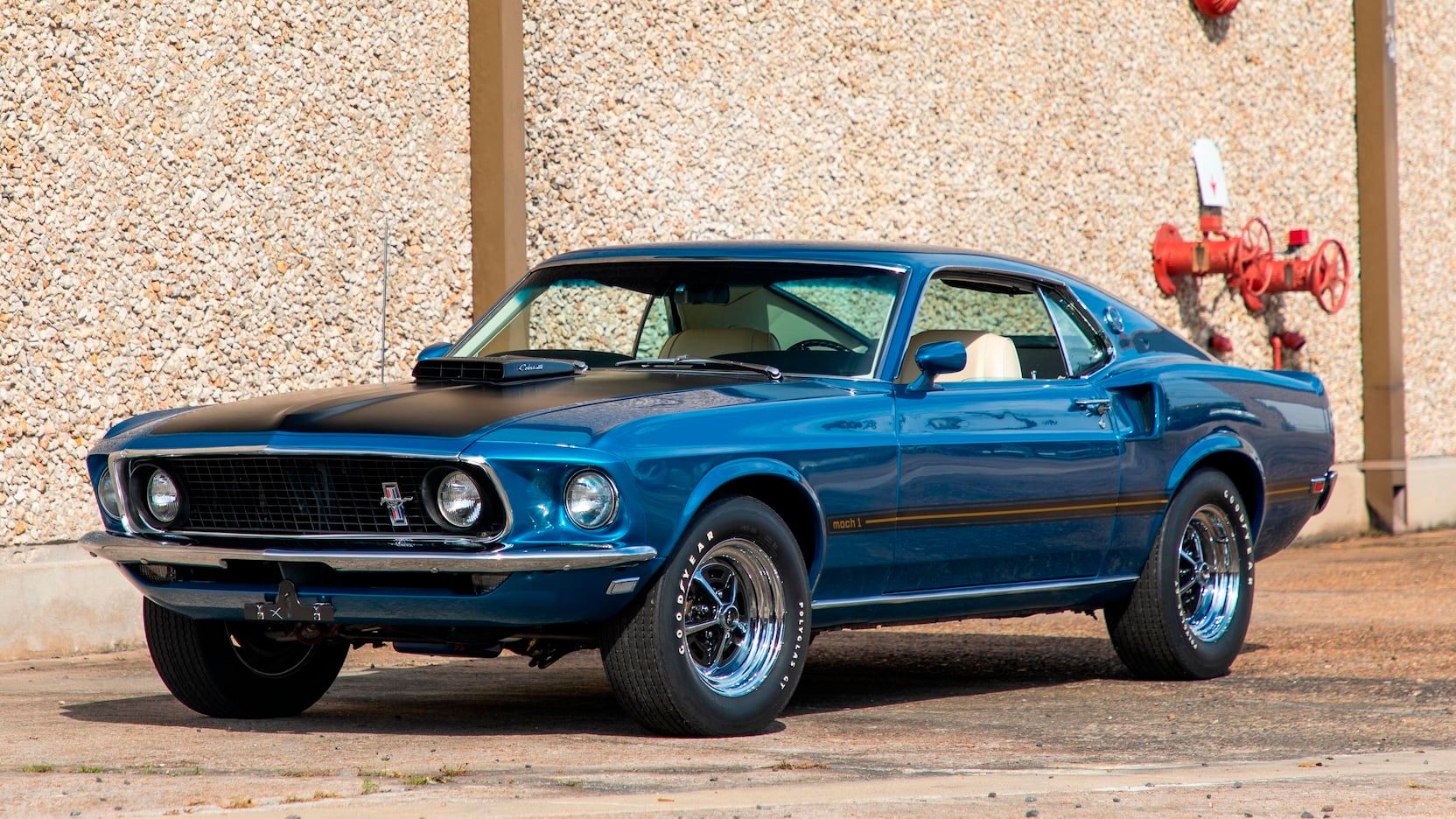 A parked 1969 Ford Mustang Mach I Cobra Jet