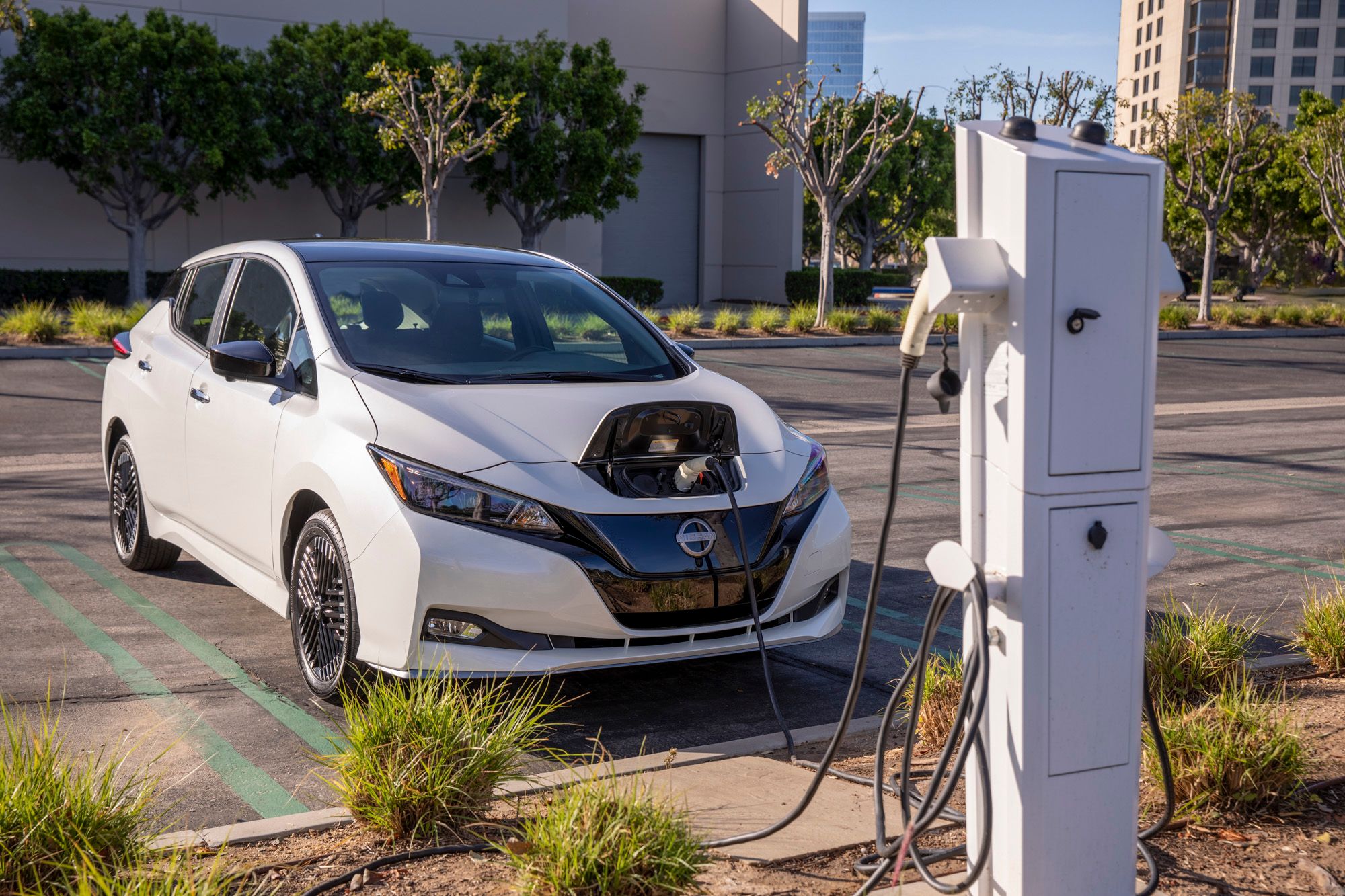 White 2023 Nissan Leaf Parked Charging