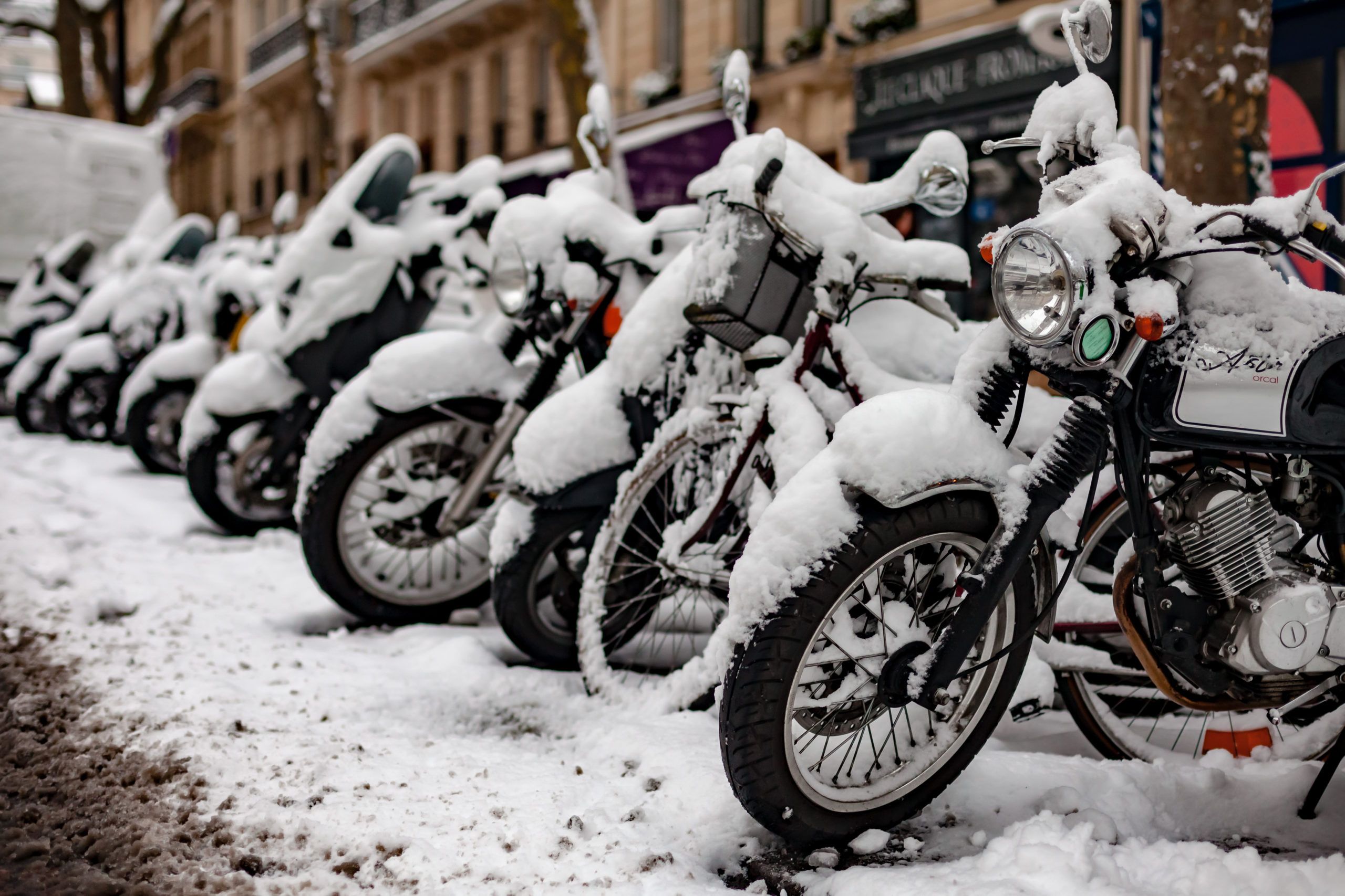 Snow covered motorcycles