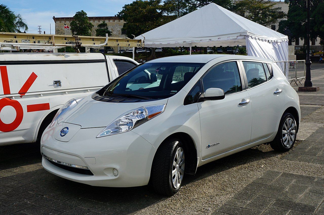 A white Nissan Leaf