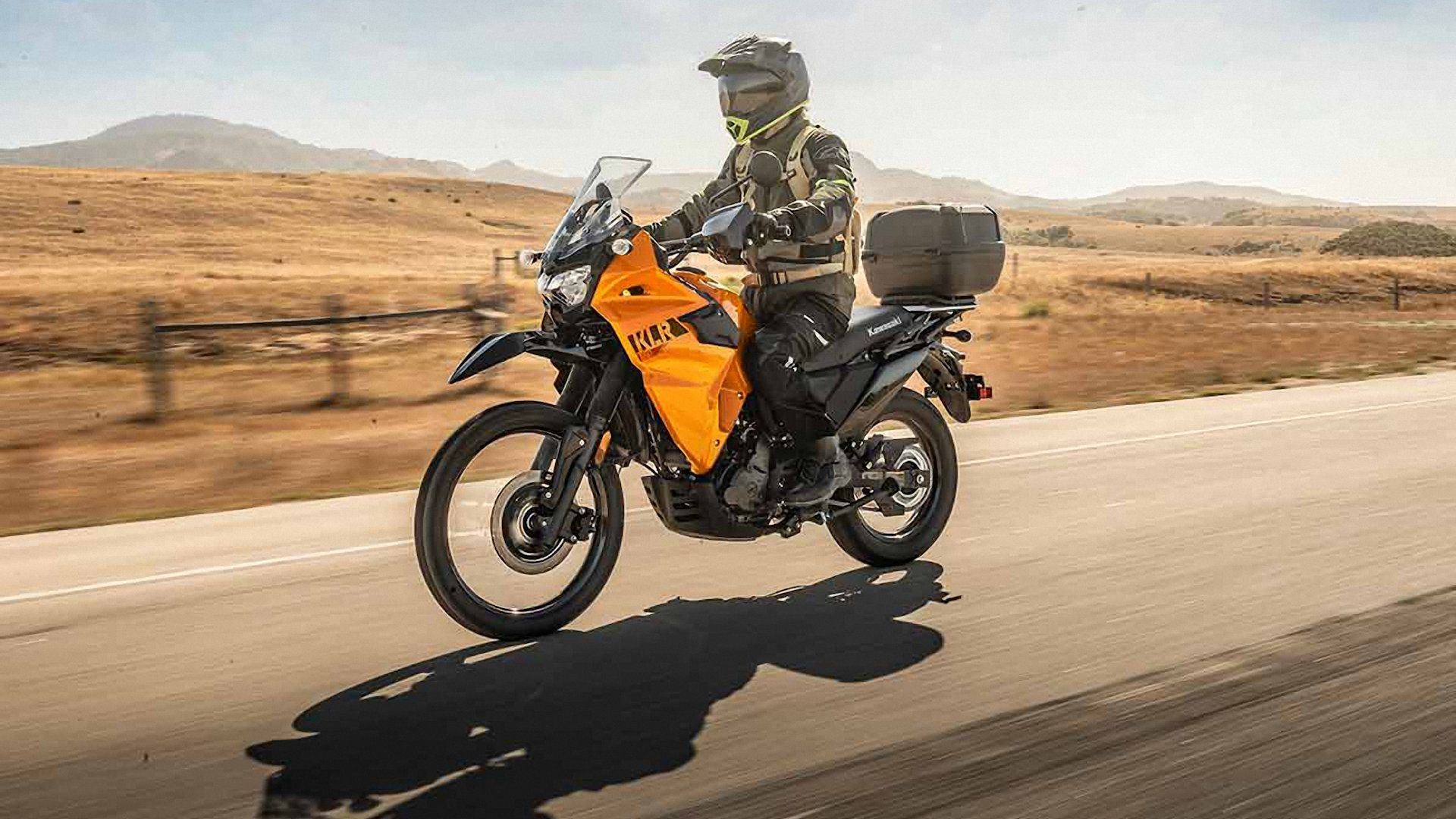 2023 Kawasaki KLR650 Yellow cruising on the road