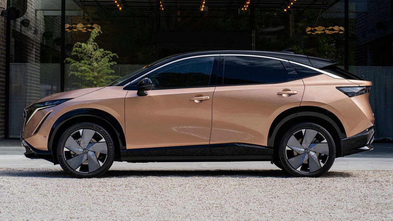 2023 Nissan Ariya Platinum+ e-4ORCE AWD in copper/black exterior.