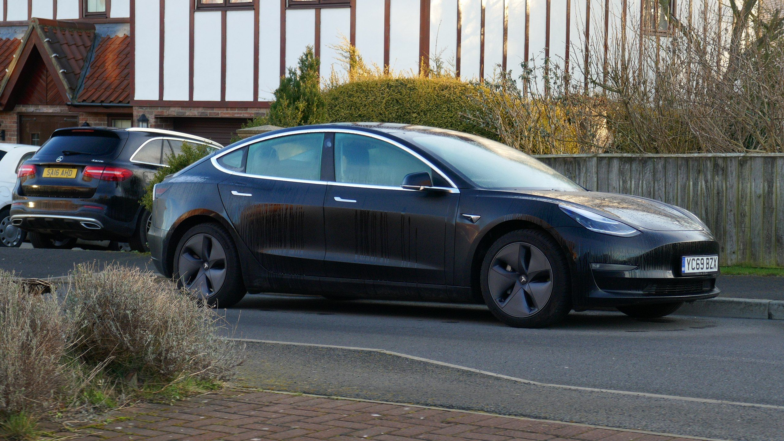 A black Tesla on the road