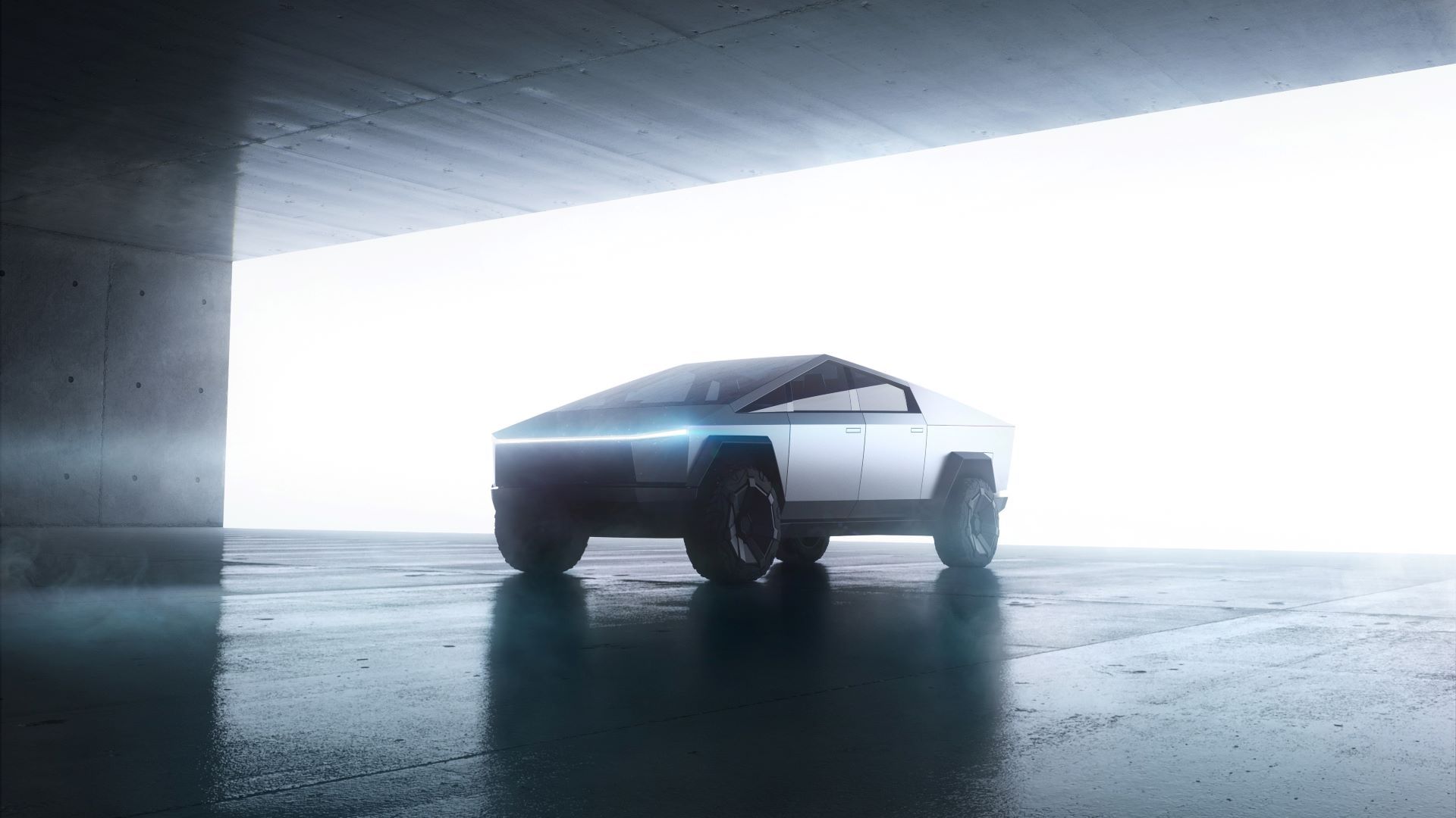 Tesla Cybertruck entrando em um galpão