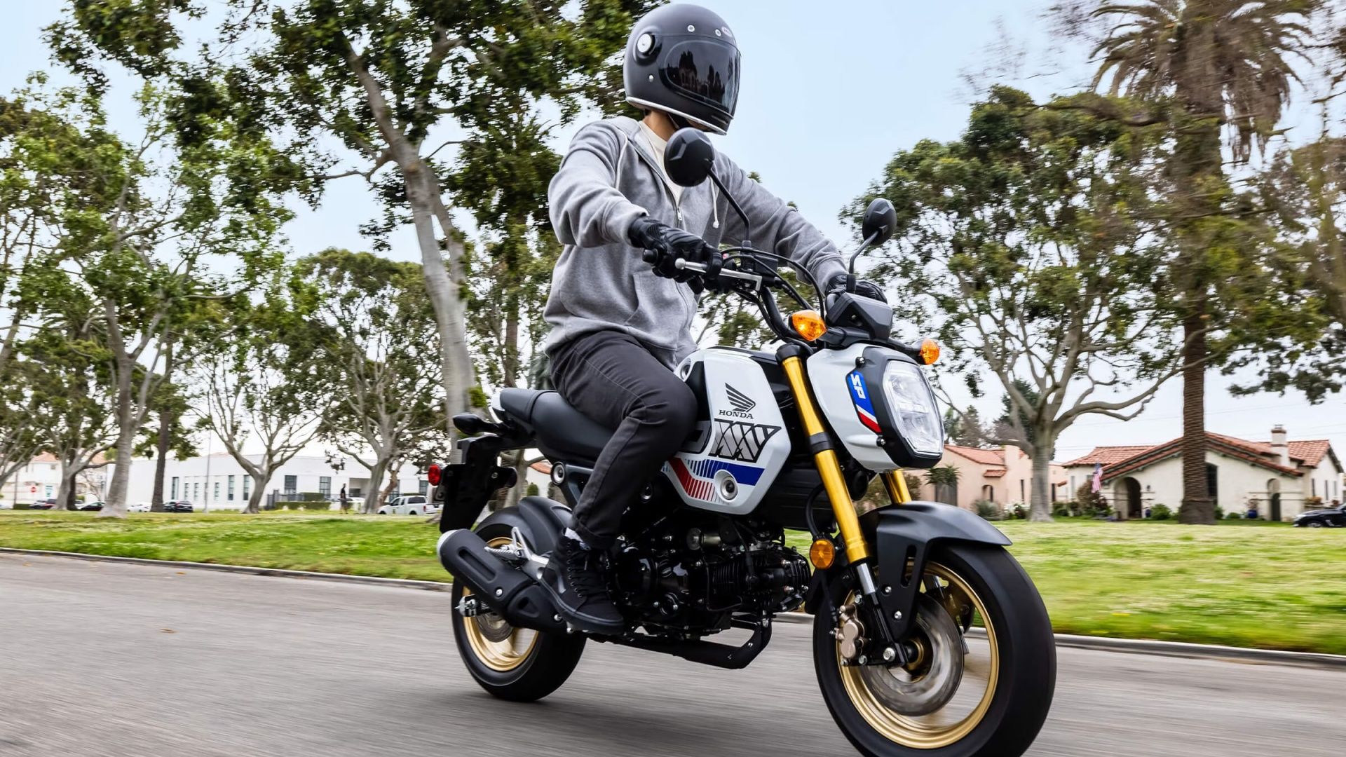 An action 3/4 front shot of a 2023 Honda Grom