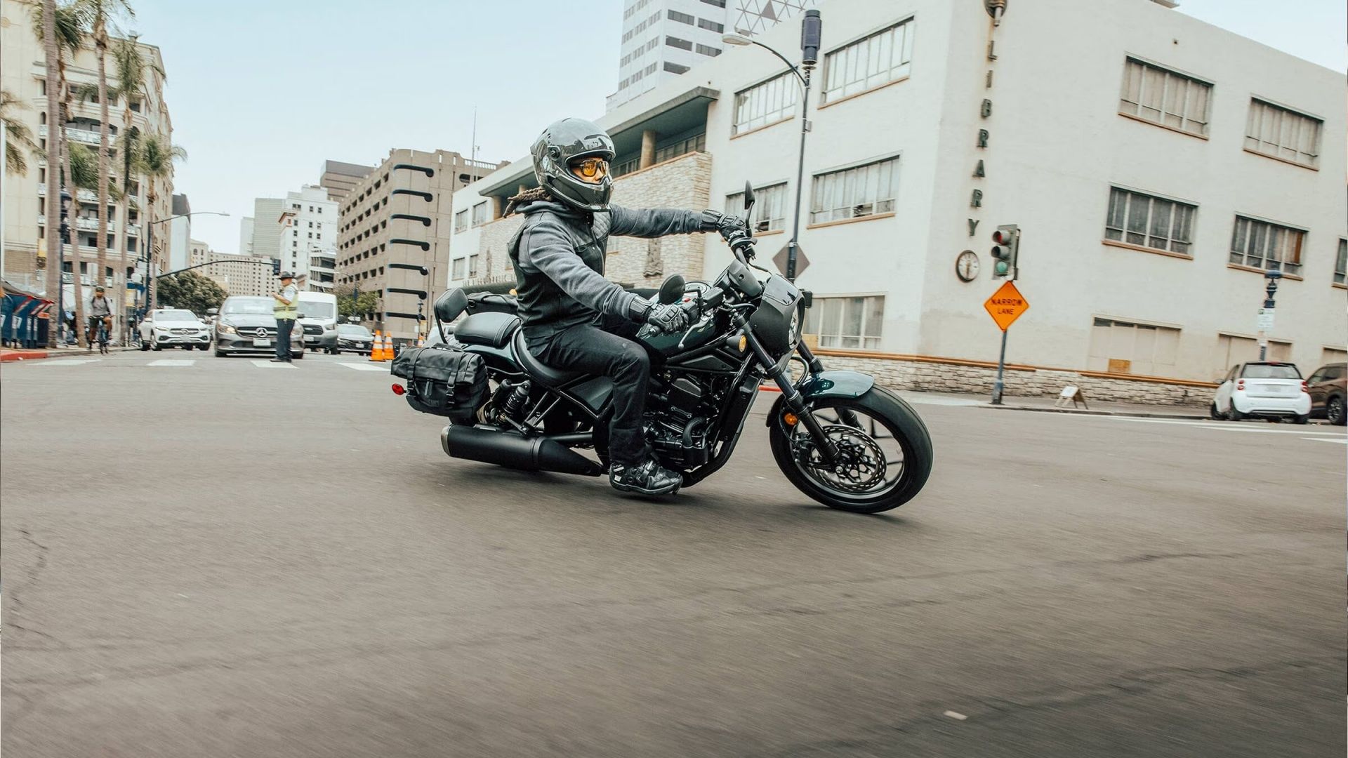 An action shot of a 2023 Honda Rebel 1100 making a corner