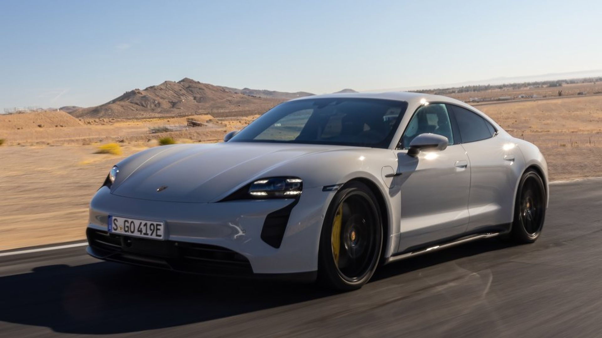 White Color Porsche Taycan Front And Side Angle Shot