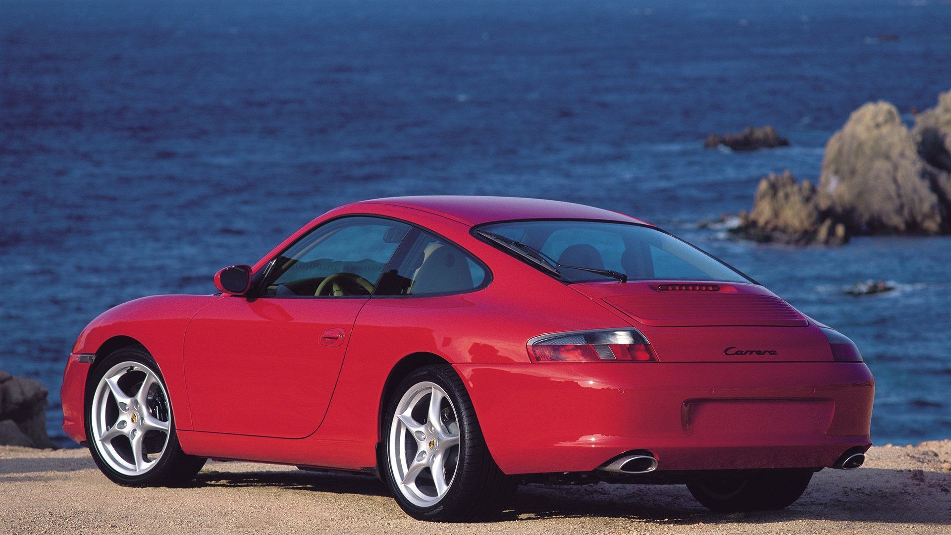 red 2002 Porsche 911 Carrera