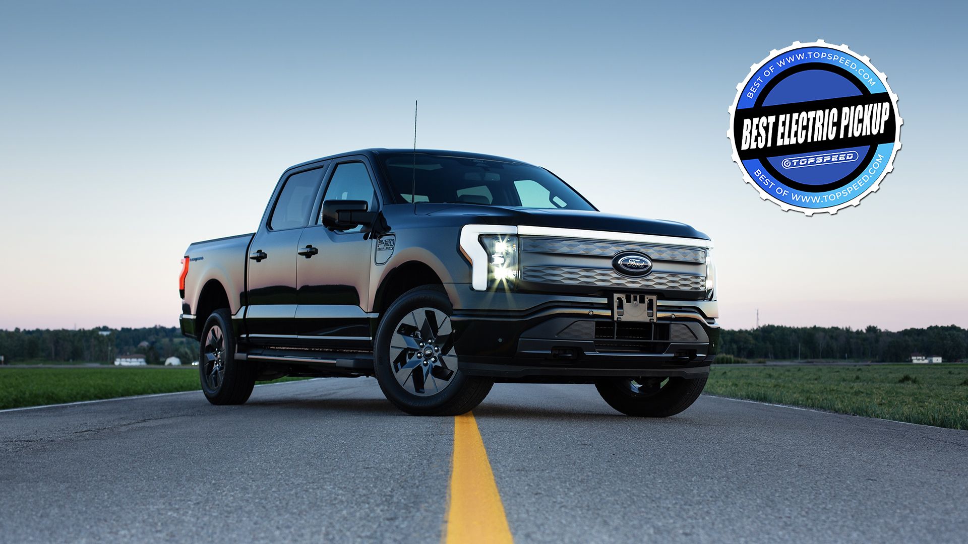 Black Ford F150 Lightning Electric Truck On The Road