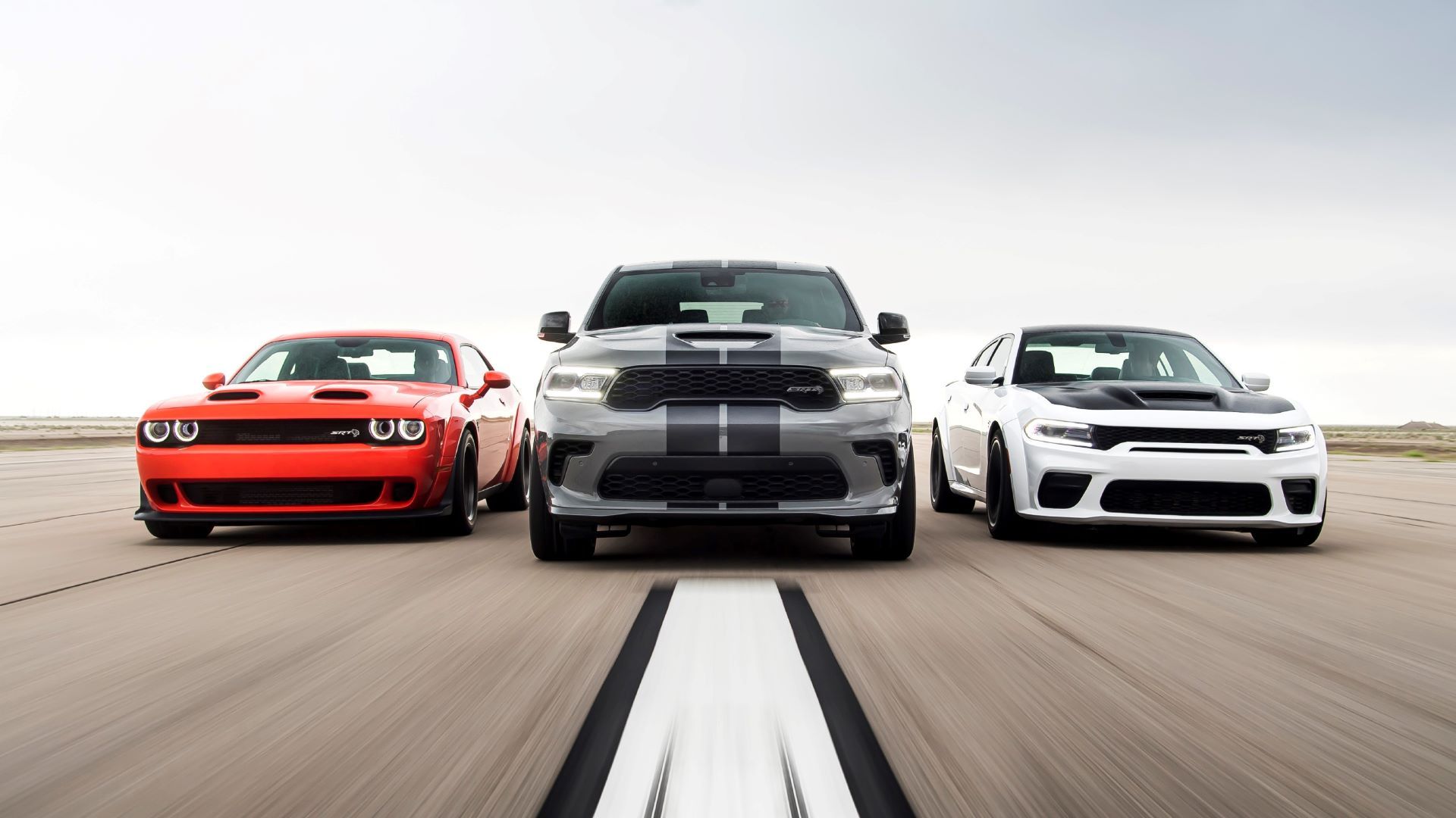 Wide shot of 2021 Dodge Durango SRT Hellcat, 2021 Dodge Challenger and 2021 Dodge Charger SRT Hellcat