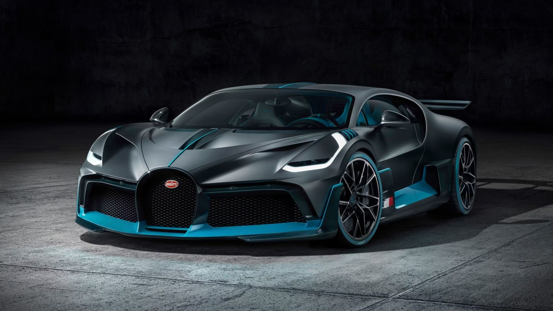 Gray and blue 2019 Bugatti Divo front 3/4 studio shot