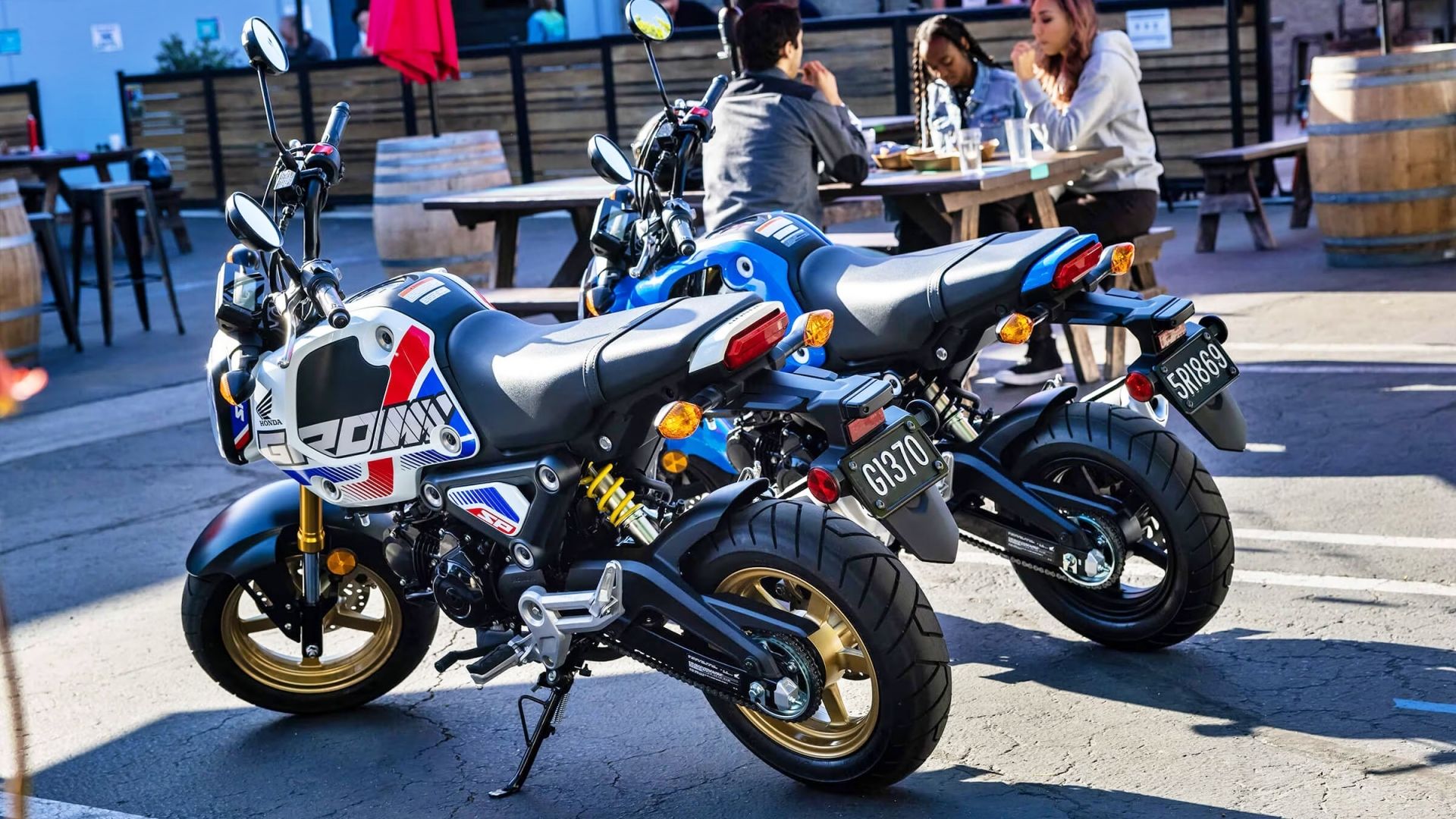 White and blue 2023 Honda Grom parked