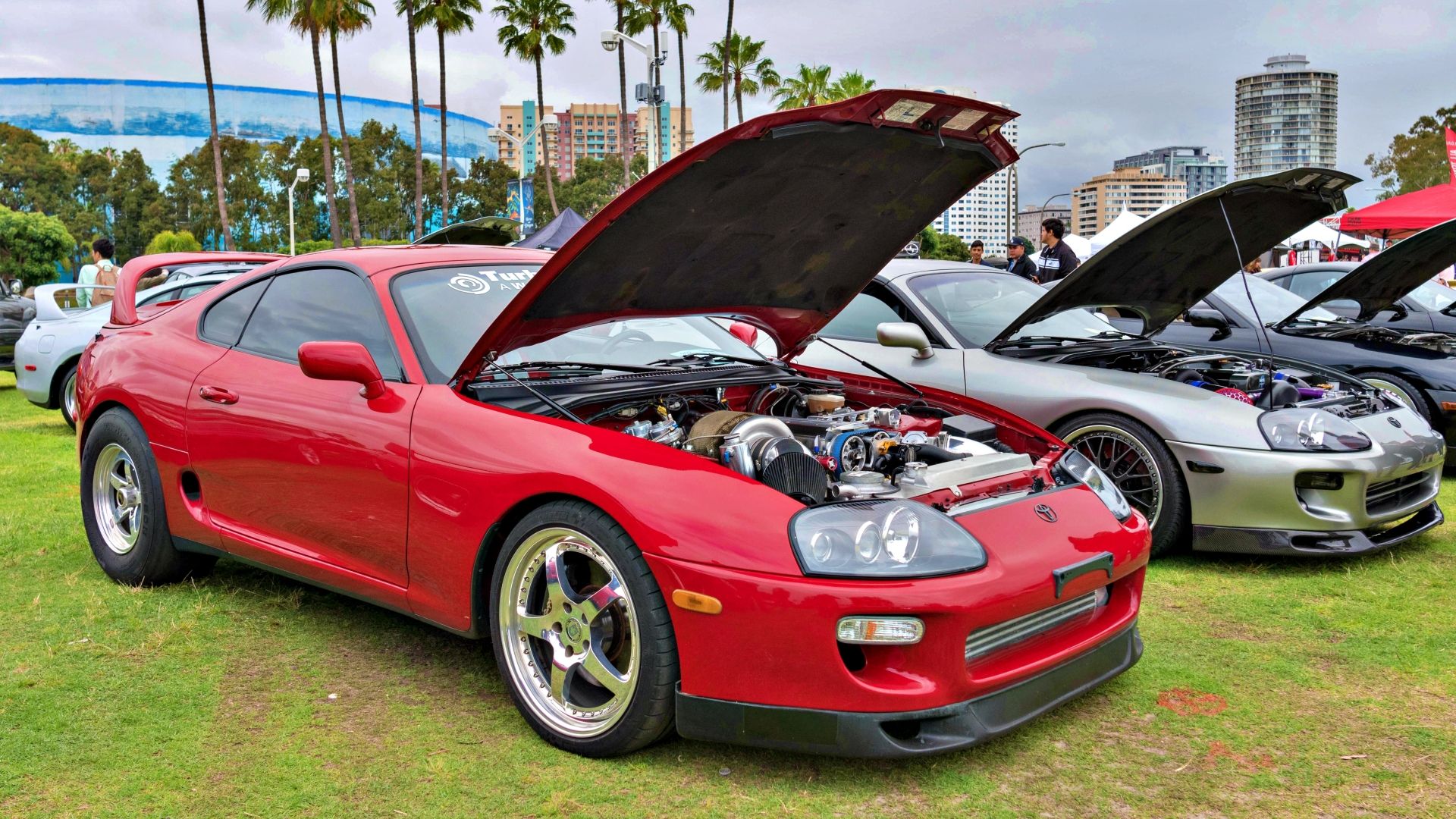 Red 1994 Toyota Supra hood open