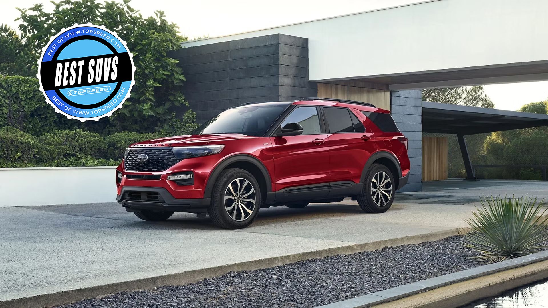 Red 2023 Ford Explorer parked in a driveway