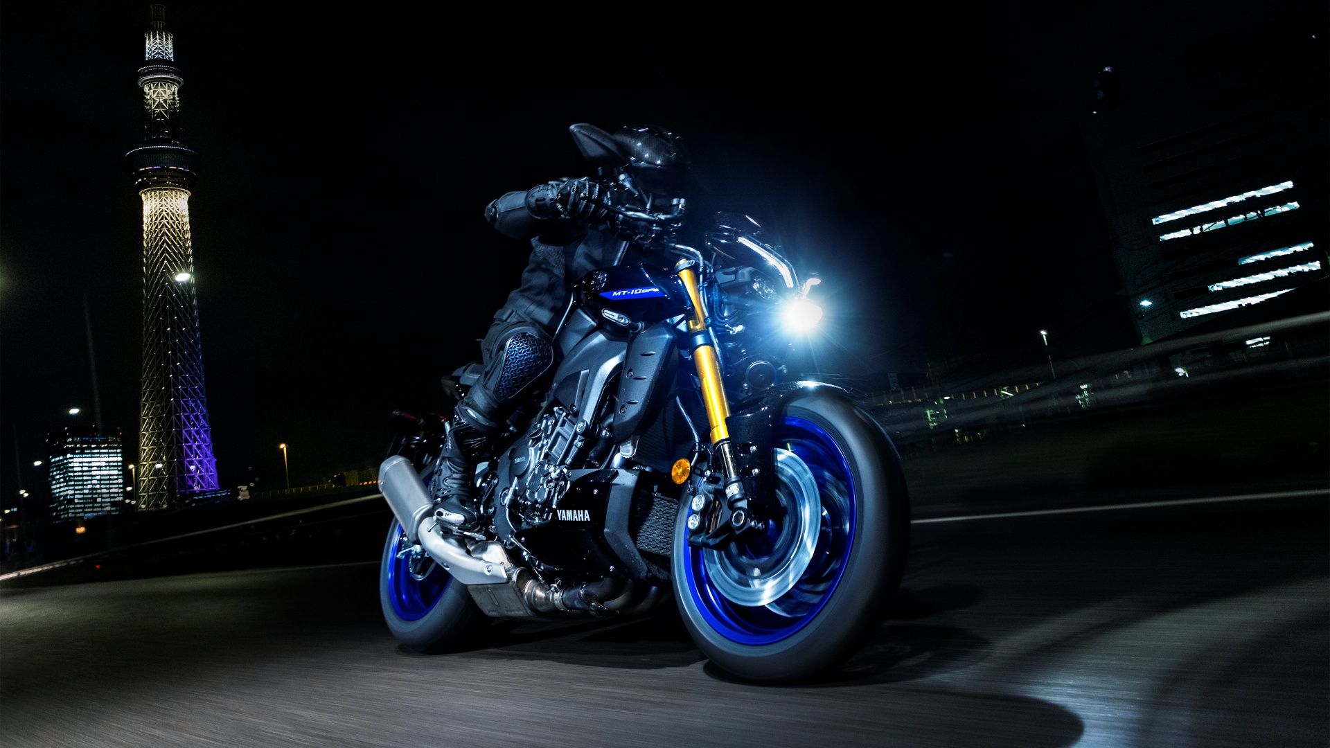 An action front shot of a 2023 YAMAHA MT-10